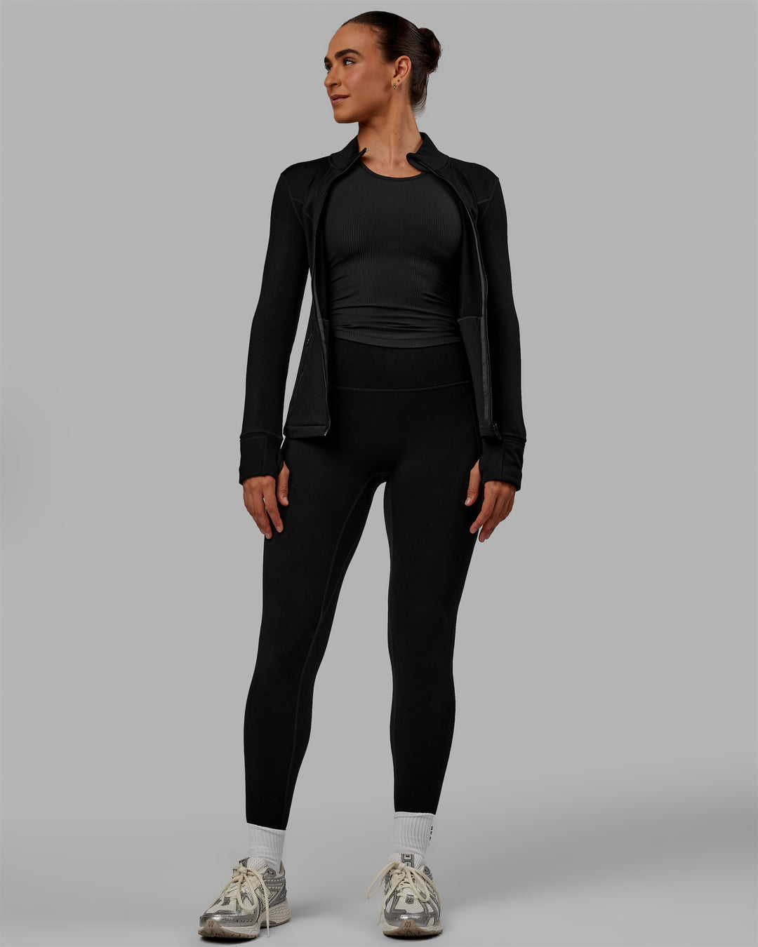 Woman wearing Motion Full Length Thermal Leggings - Black