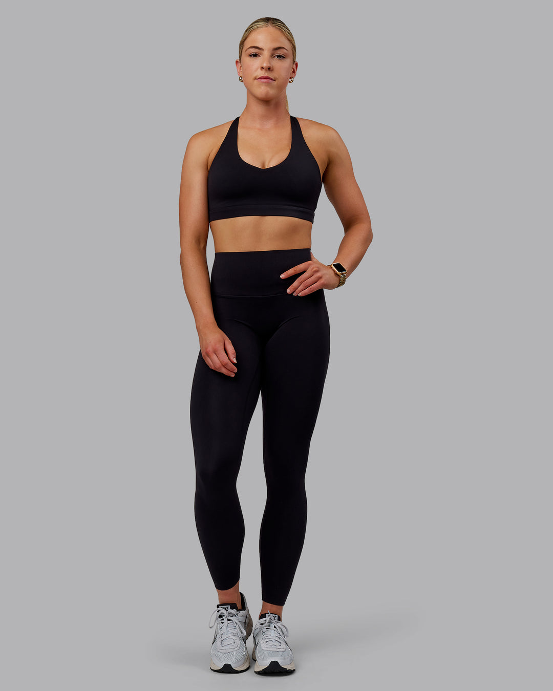 Woman wearing Nirvana Sports Bra - Black