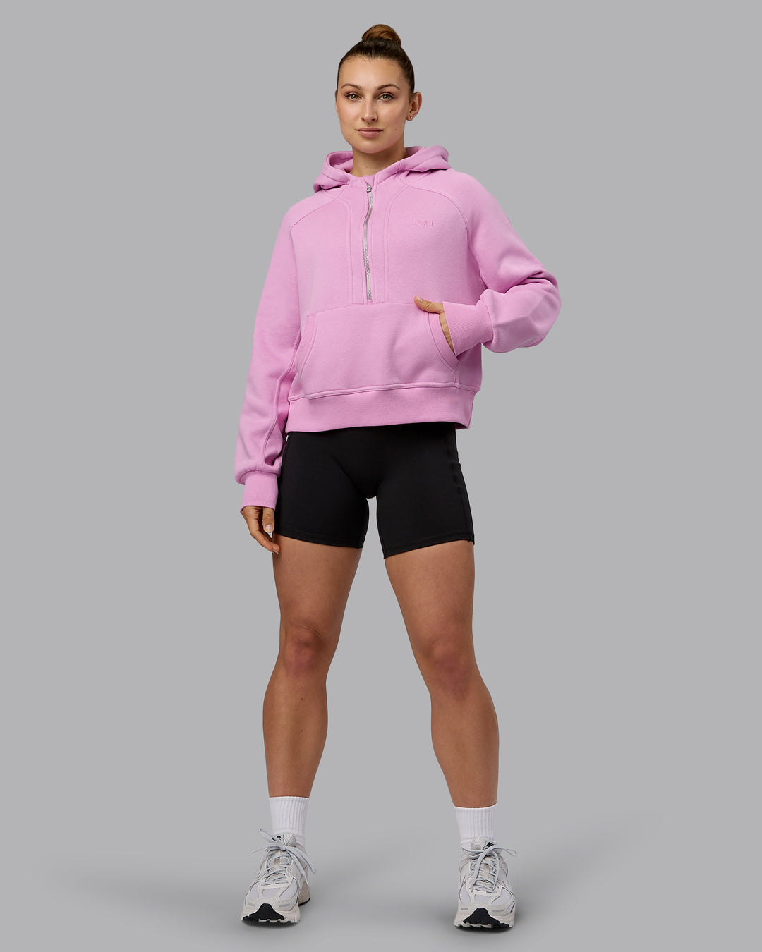 Woman wearing Pursue Hoodie - Pastel Orchid