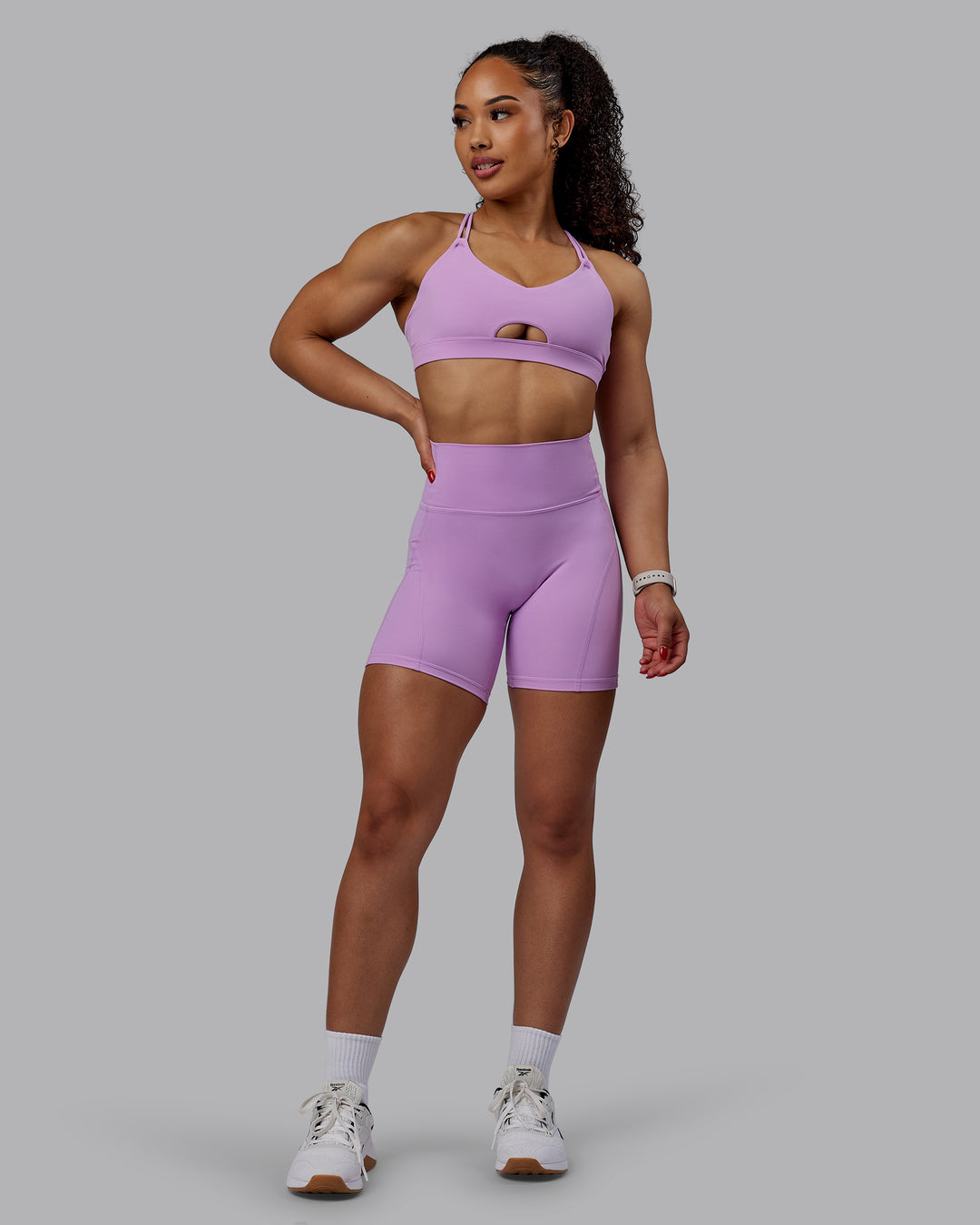 Woman wearing Pursue Sports Bra - Light Violet