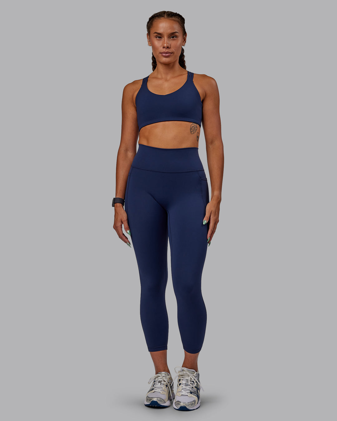 Woman wearing Push The Limit Sports Bra - Future Navy