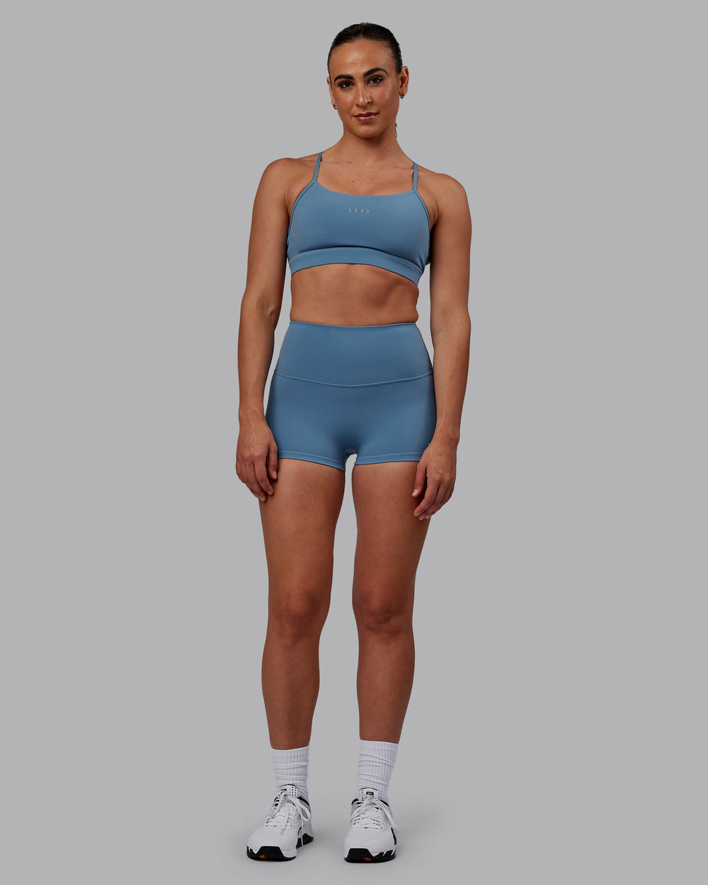 Woman wearing RXD High Waist Micro Short Tights - Elemental Blue