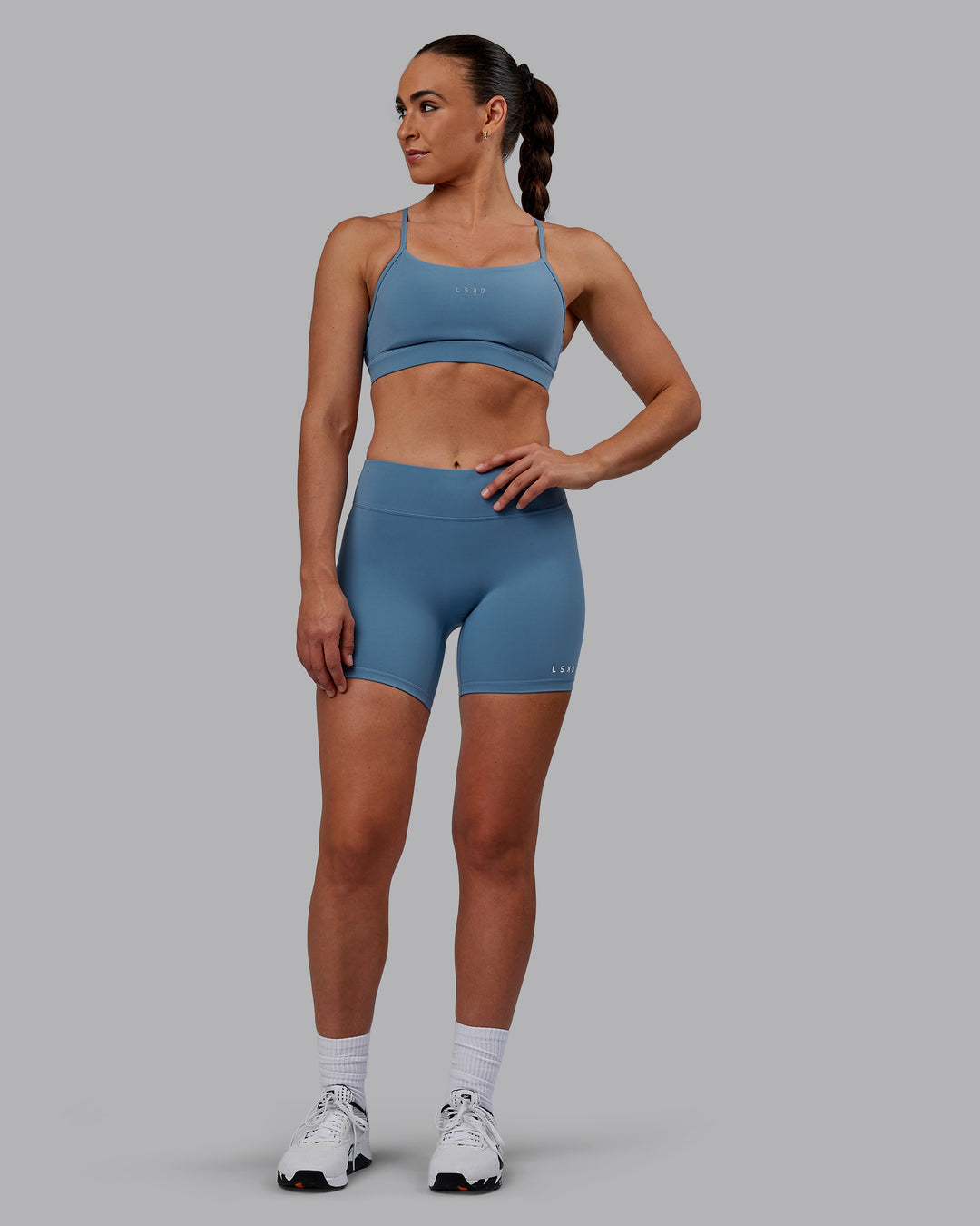 Woman wearing RXD Mid Short Tights - Elemental Blue