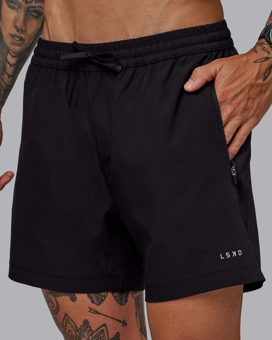 Man wearing Rep 5&quot; Lined Performance Shorts in Black | Size:S