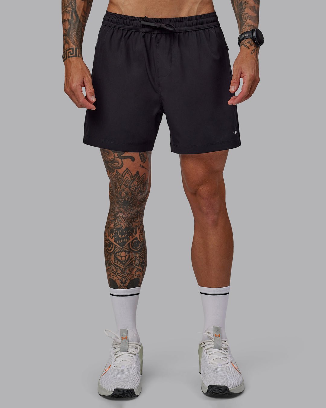 Man wearing Rep 5'' Performance Short in Black | Size:S