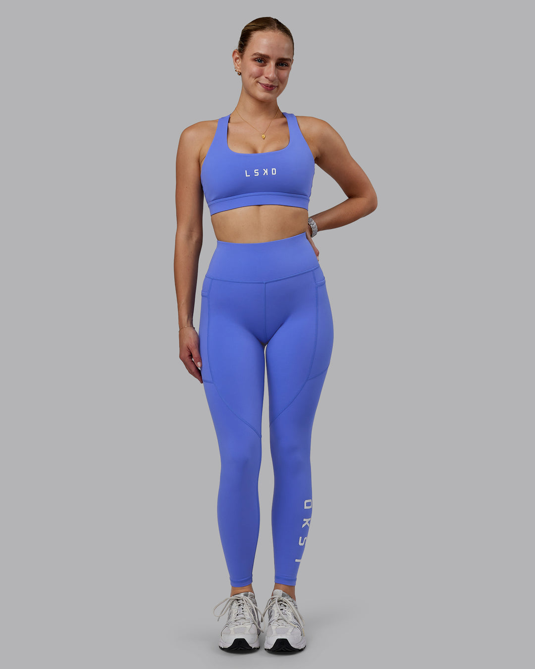 Woman wearing Rep Full Length Tights - Baja Blue-White