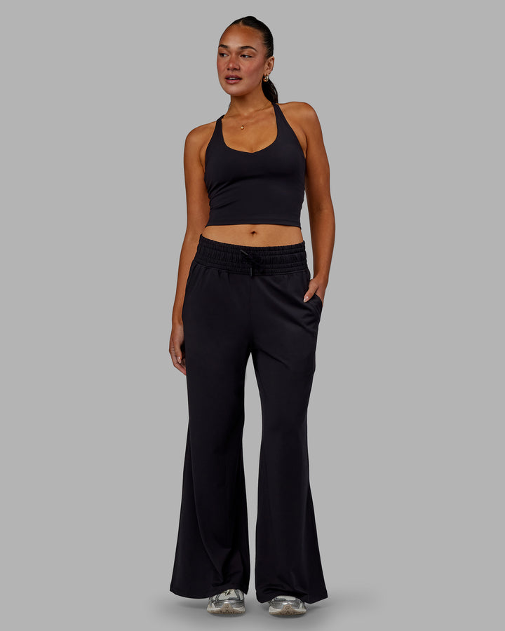 Woman wearing Restore CloudFLX Wide Leg Pants - Black
