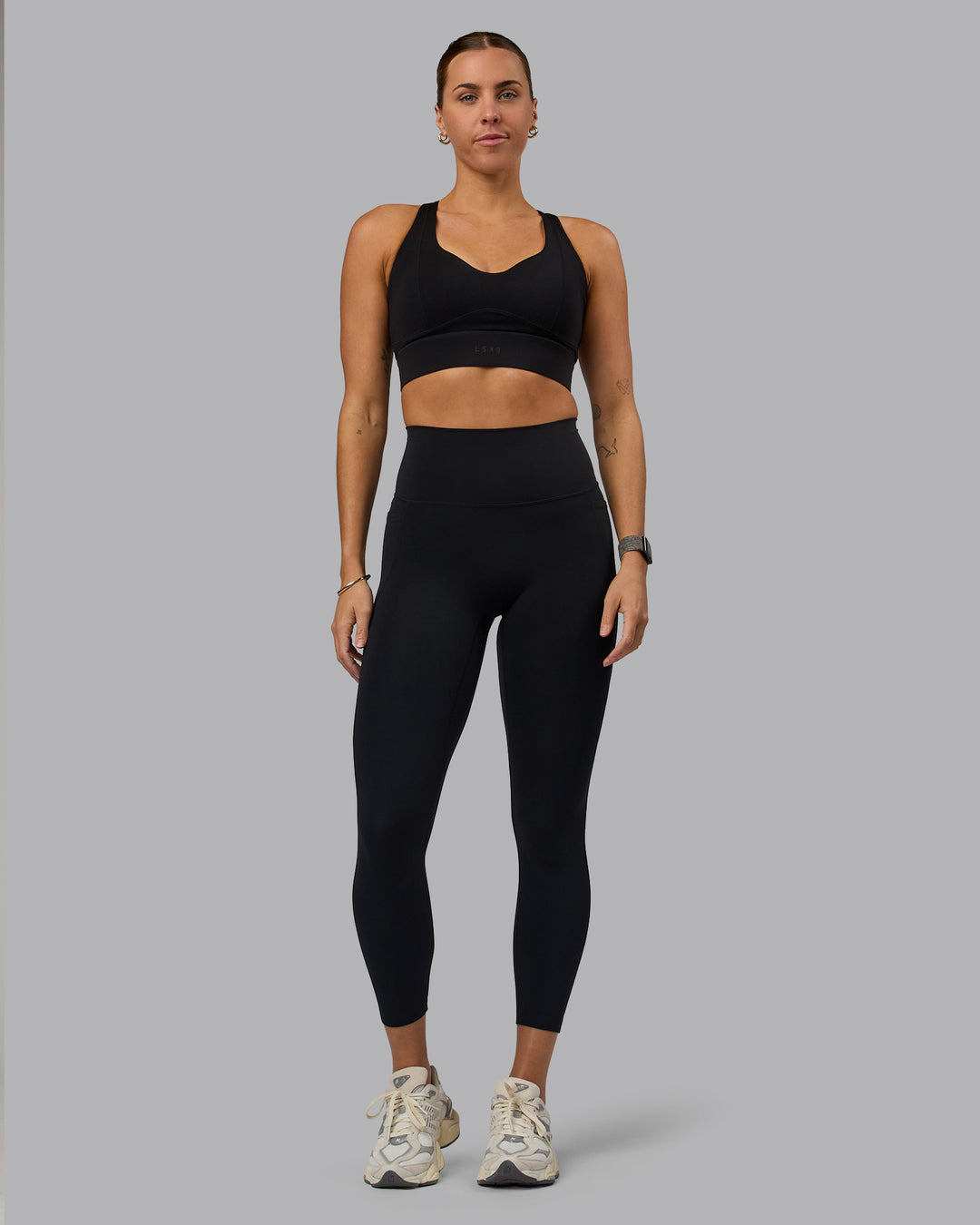 Woman wearing Sculpt Sports Bra - Black