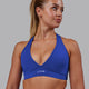 Woman wearing Stamina Sports Bra - Power Cobalt
