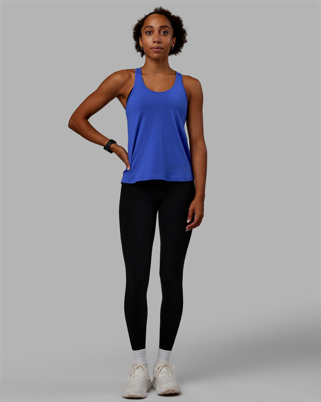 Woman wearing Static PimaFLX-Lite Tank - Power Cobalt