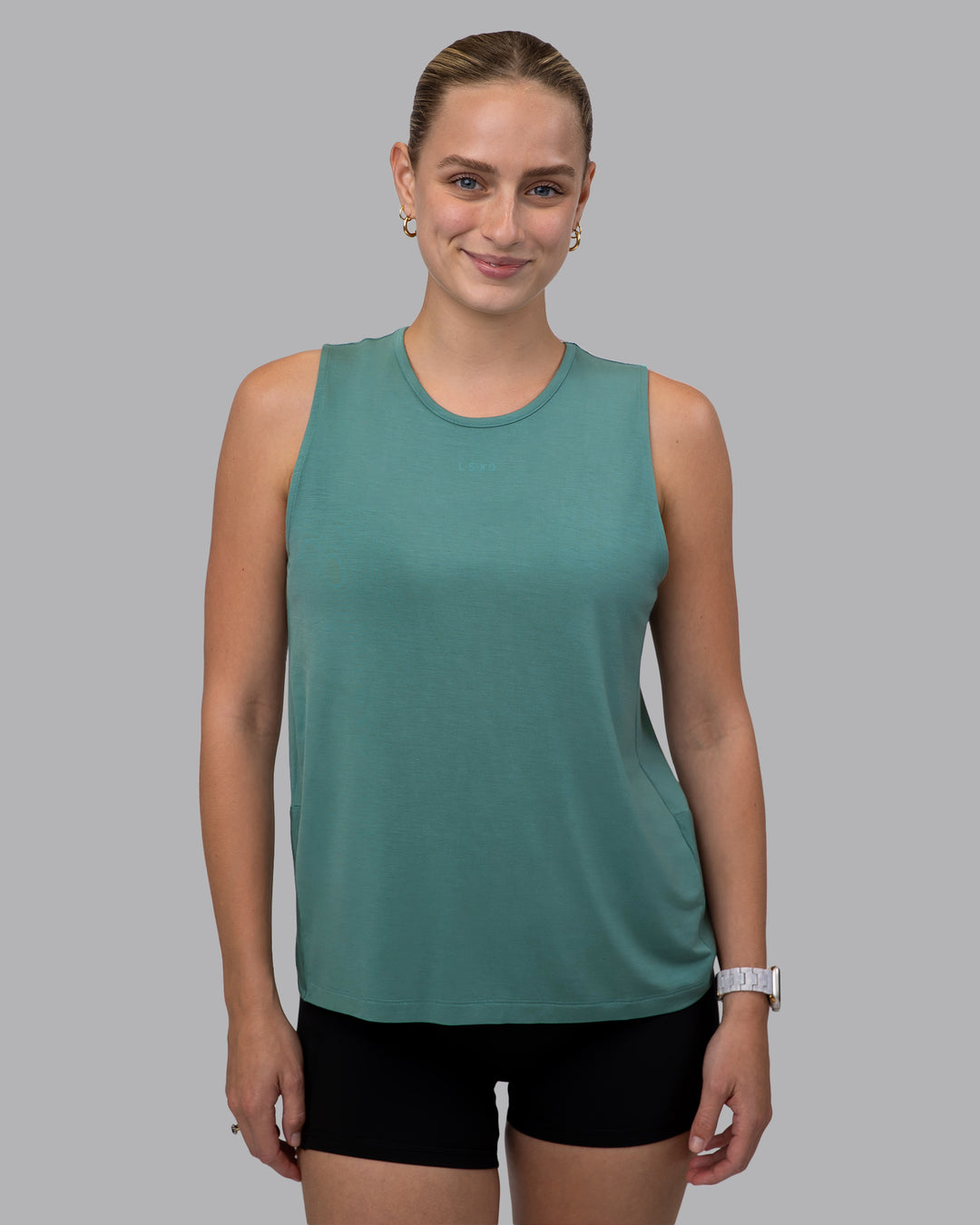 Woman wearing Swivel Open Back Tank - Sagebrush