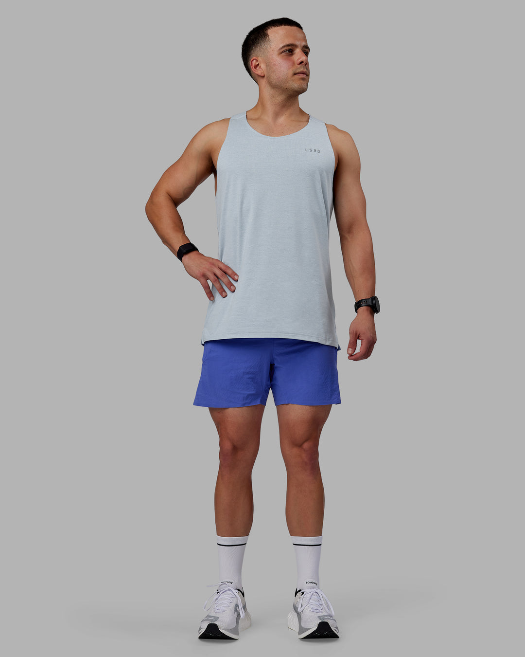 Man wearing UltraAir 5&quot; Lined Performance Shorts - Baja Blue-Reflective