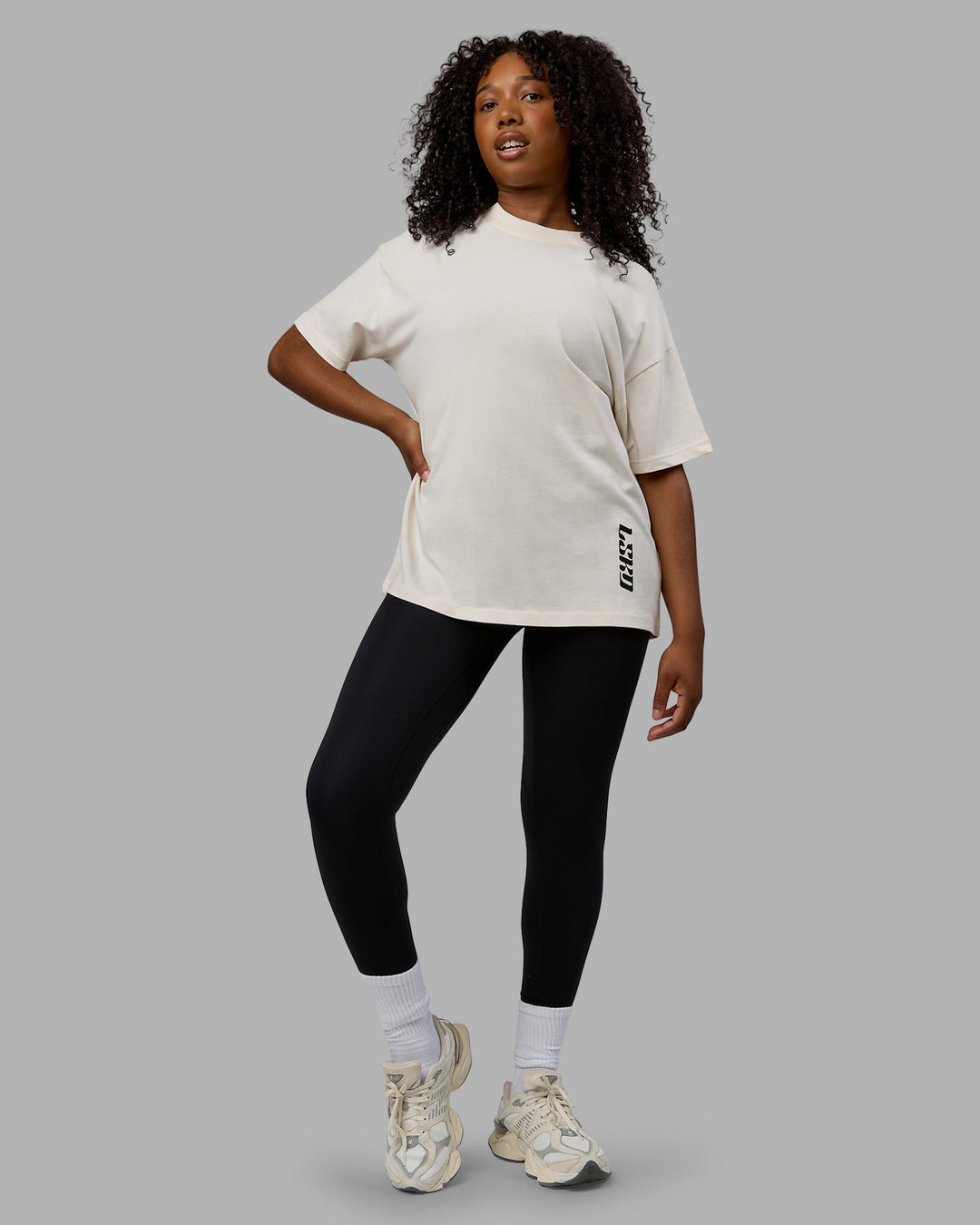 Woman wearing Unisex Fail Forward Heavyweight FLXCotton Tee Oversize - Off White-Black