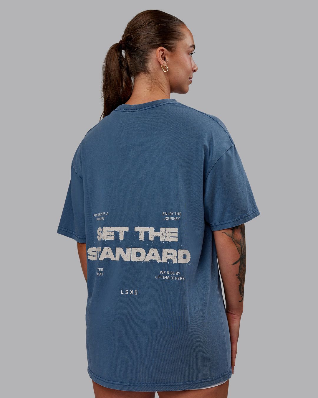 Woman wearing Set The Standard Washed FLXCotton Oversized Tee in Indigo | Size:S