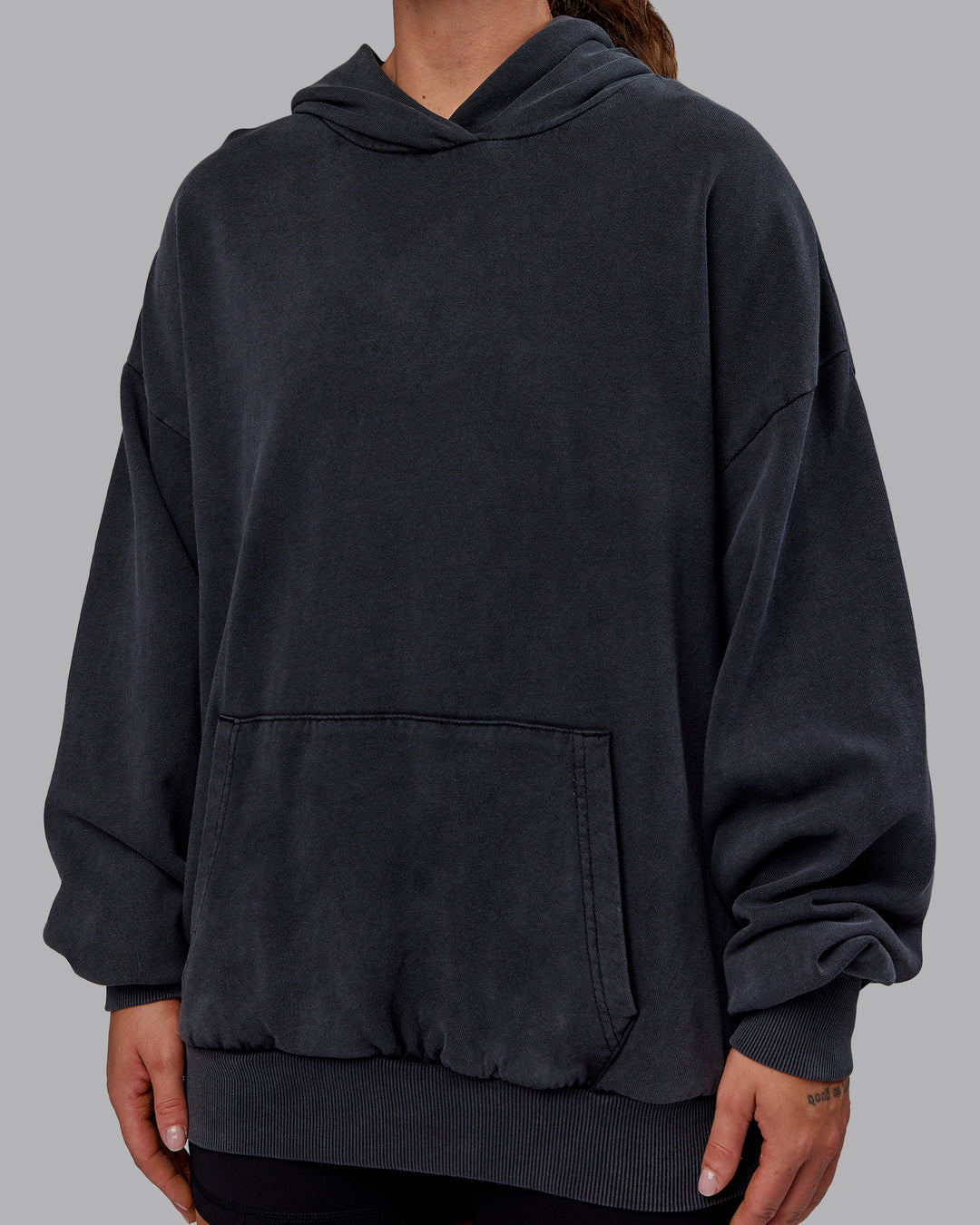 Woman wearing Set the Standard Washed Oversized Hoodie in Black-Black | Size:S