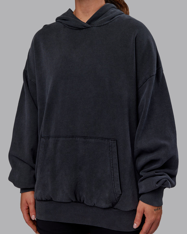 Woman wearing Set the Standard Washed Oversized Hoodie in Black-Black | Size:S
