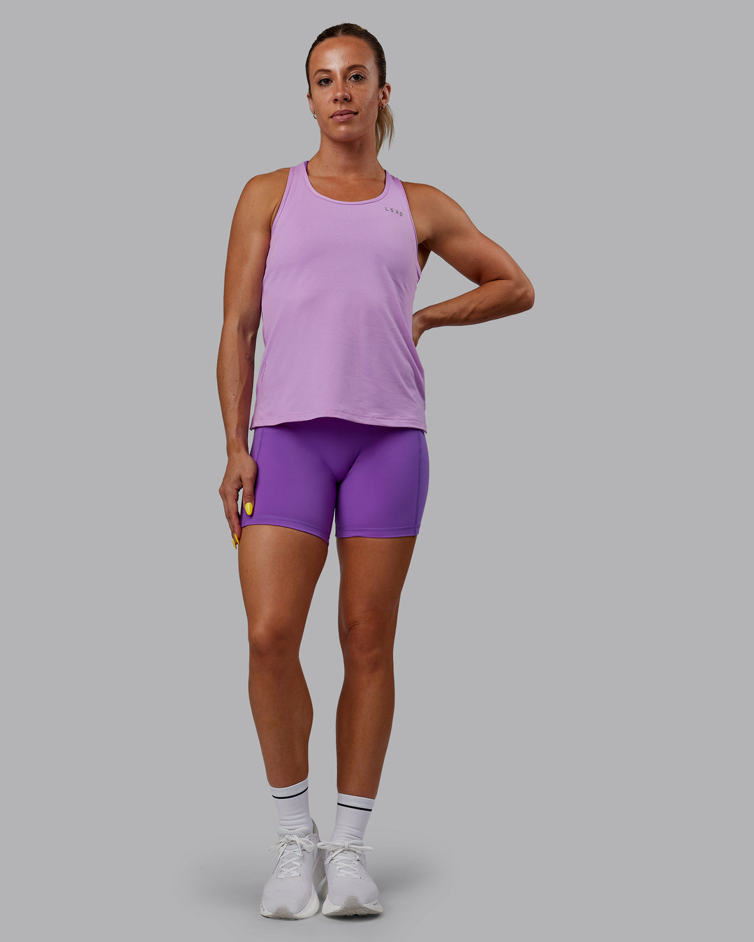 Woman wearing Perform VapourFLX Tank - Light Violet