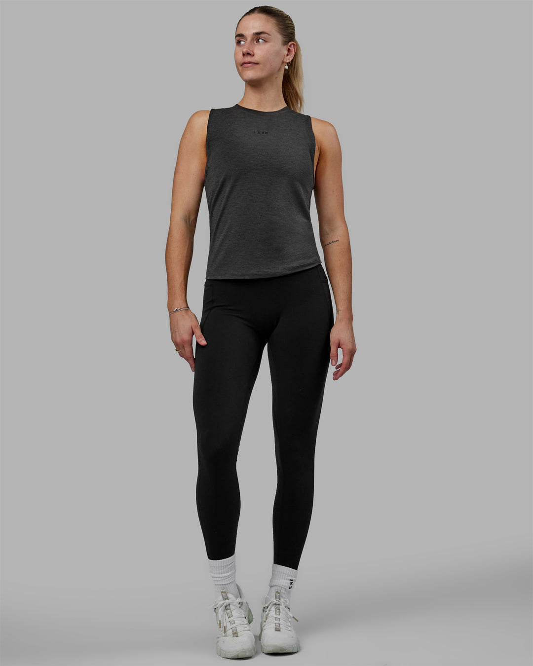 Woman wearing Vital Training Tank - Charcoal Marl