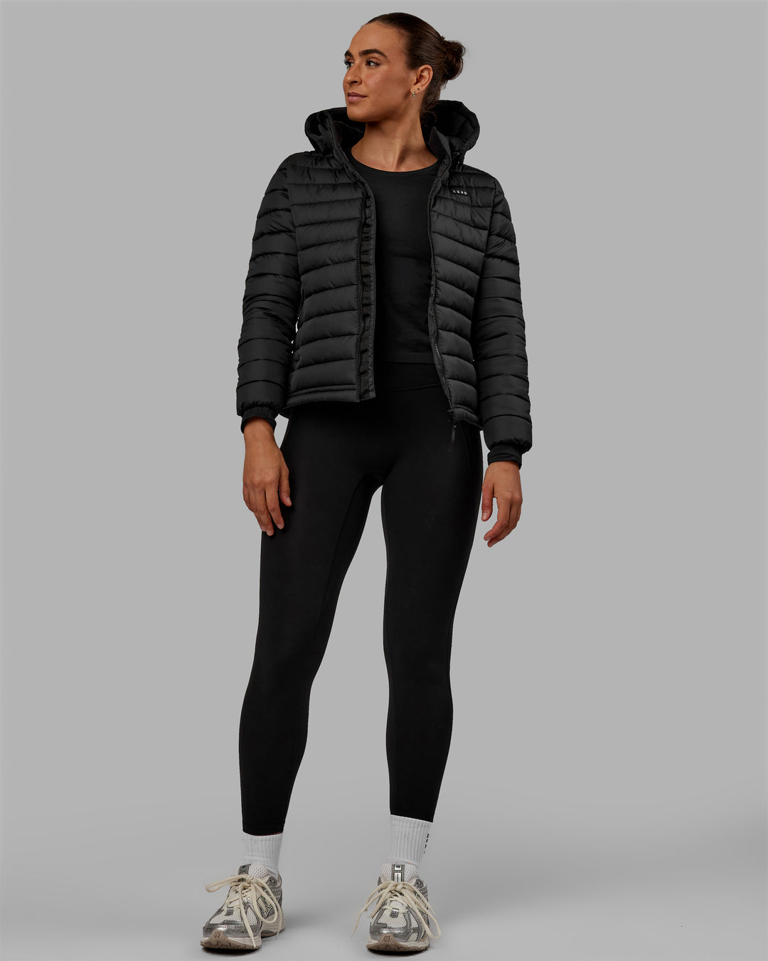 Woman wearing All-day Puffer Jacket - Black