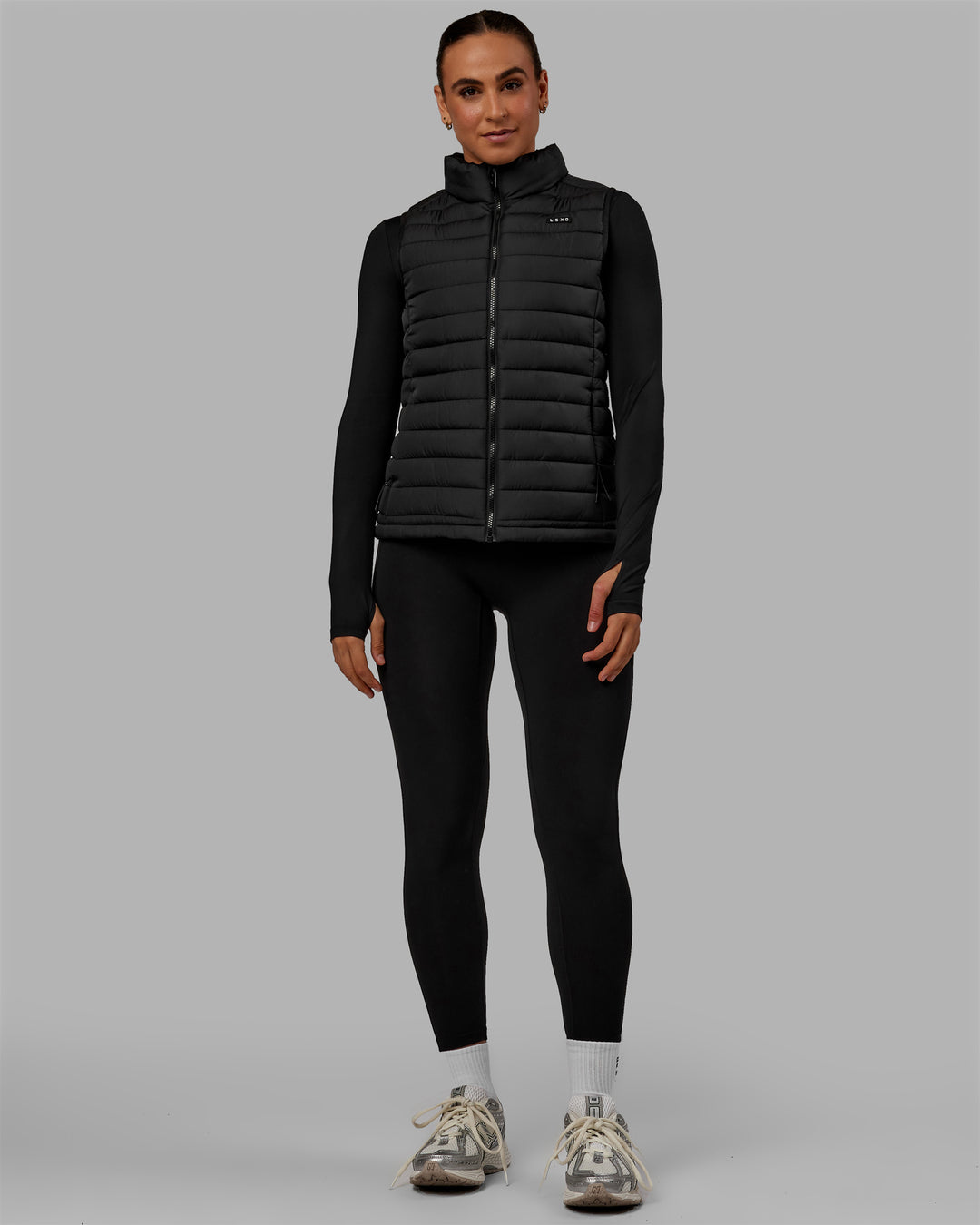 Woman wearing All-day Puffer Vest - Black