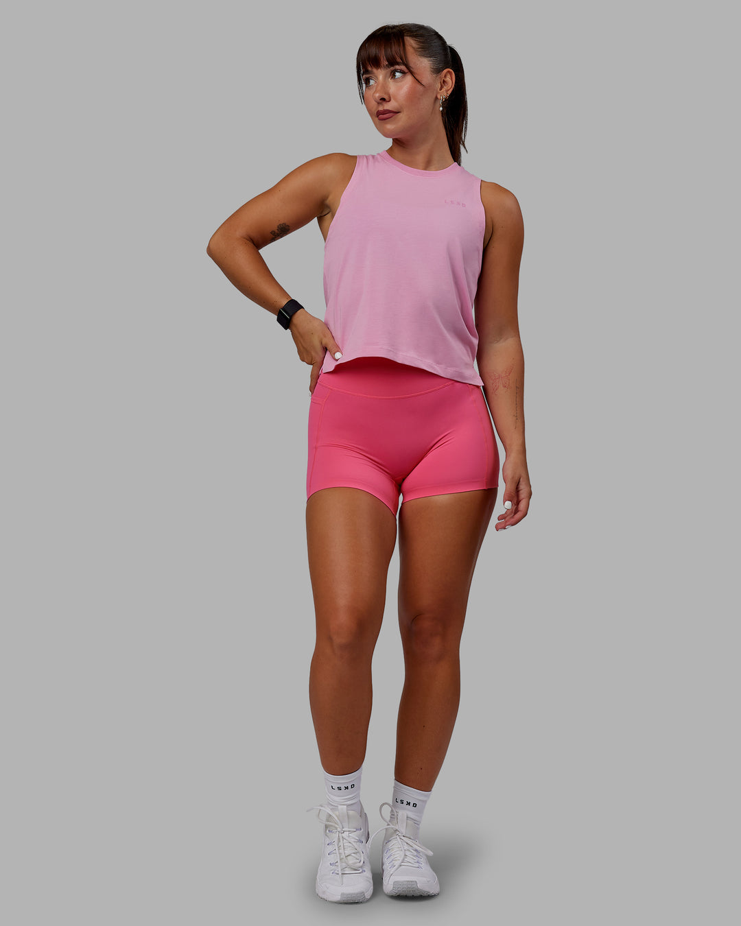 Woman wearing Deluxe PimaFLX Tank - Bubblegum