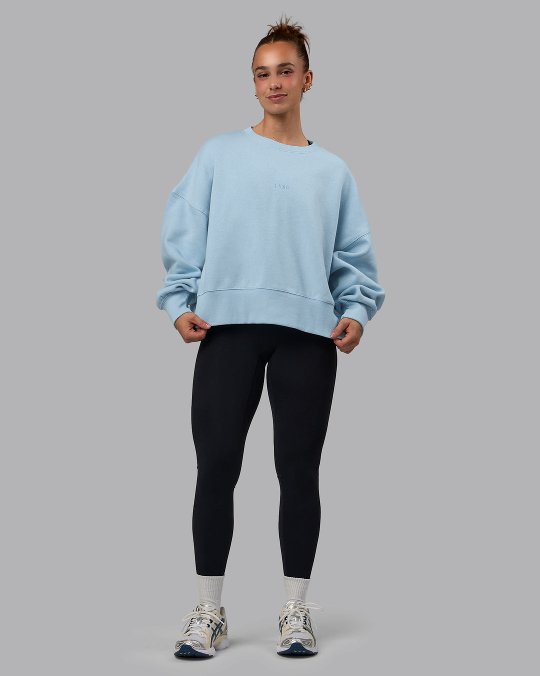 Woman wearing MVP Oversized Sweater - Glacial Blue