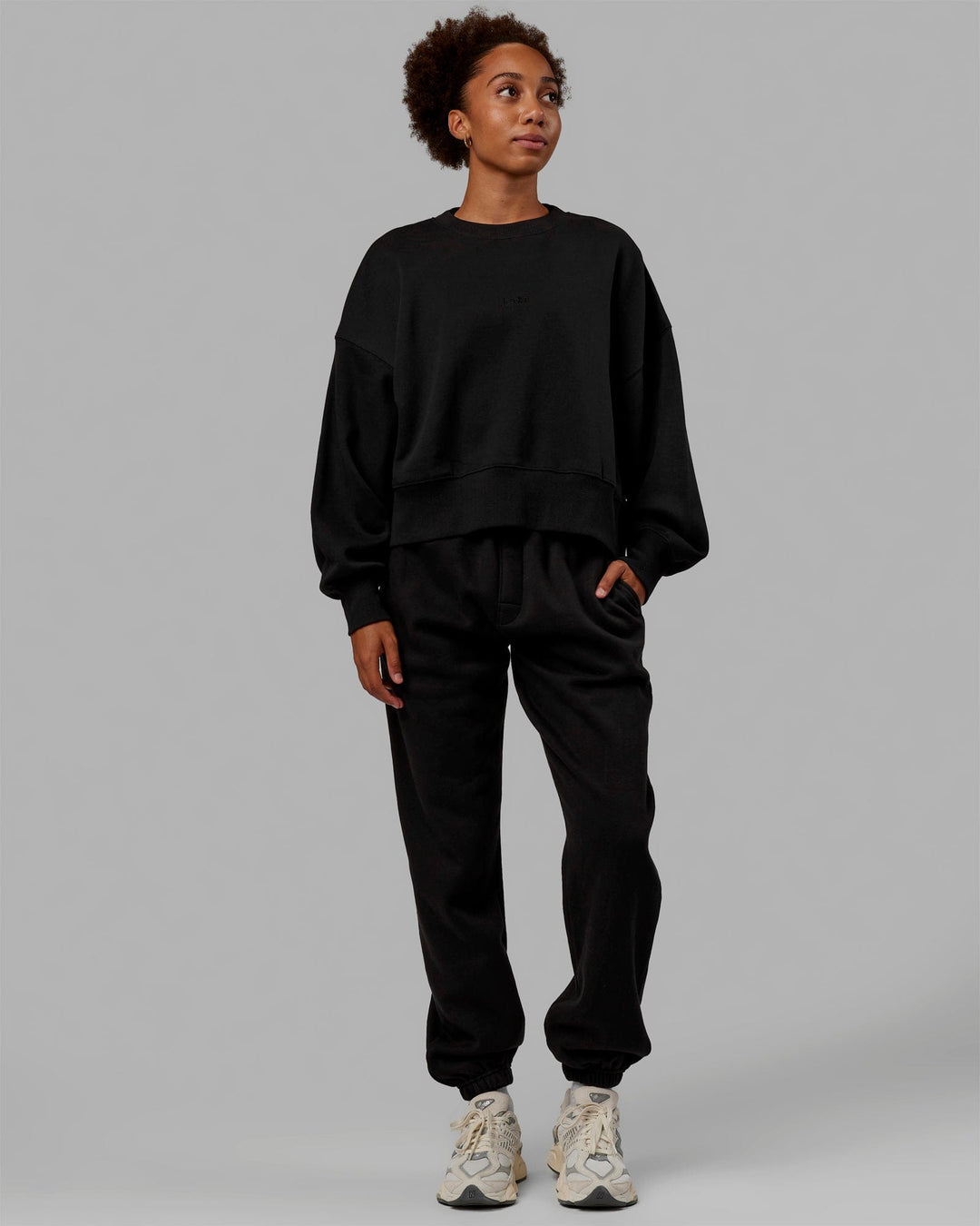 Woman wearing MVP Oversized Sweater - Black-Black