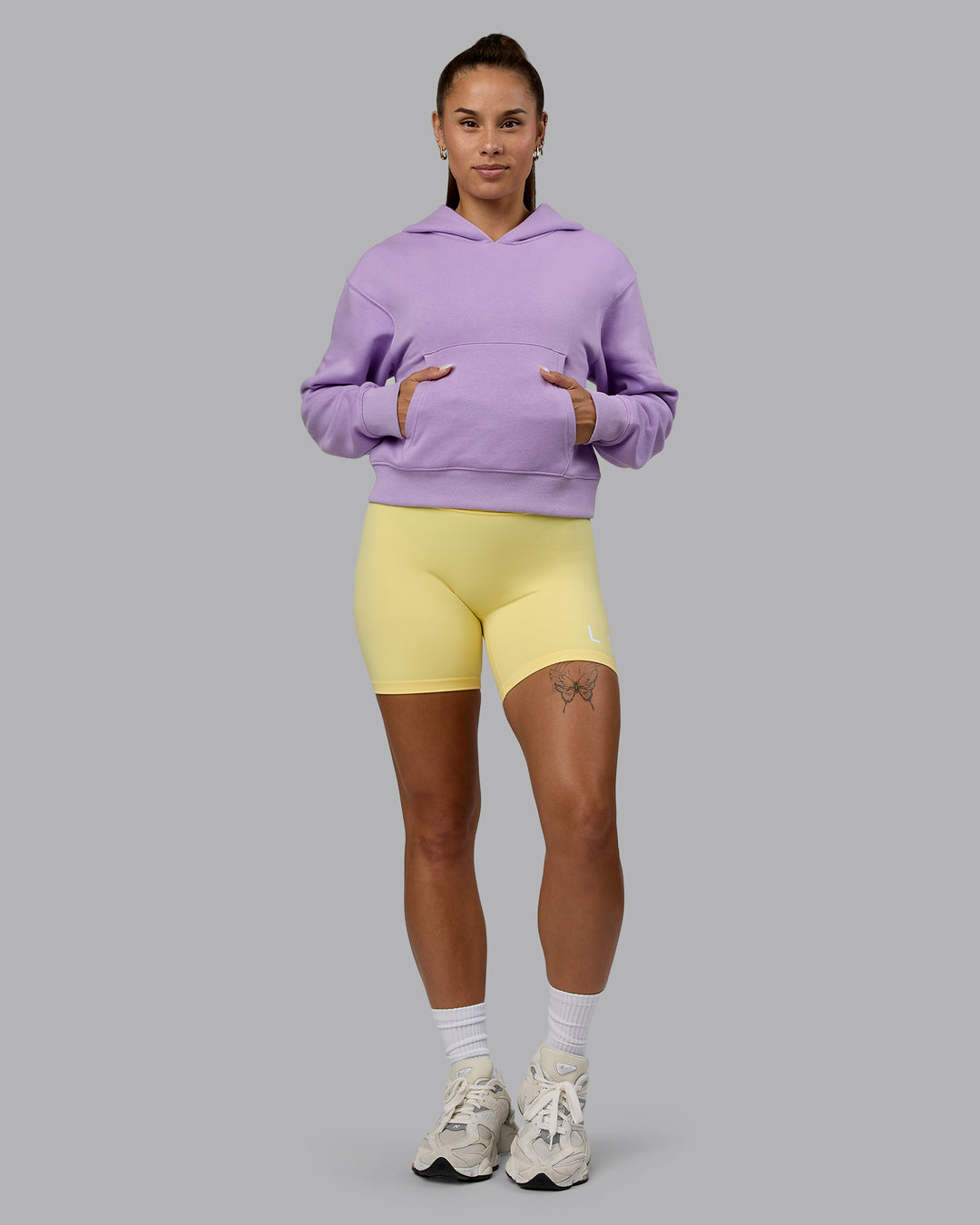 Woman wearing Set The Standard Midweight Hoodie - Pale Lilac-Elfin Yellow