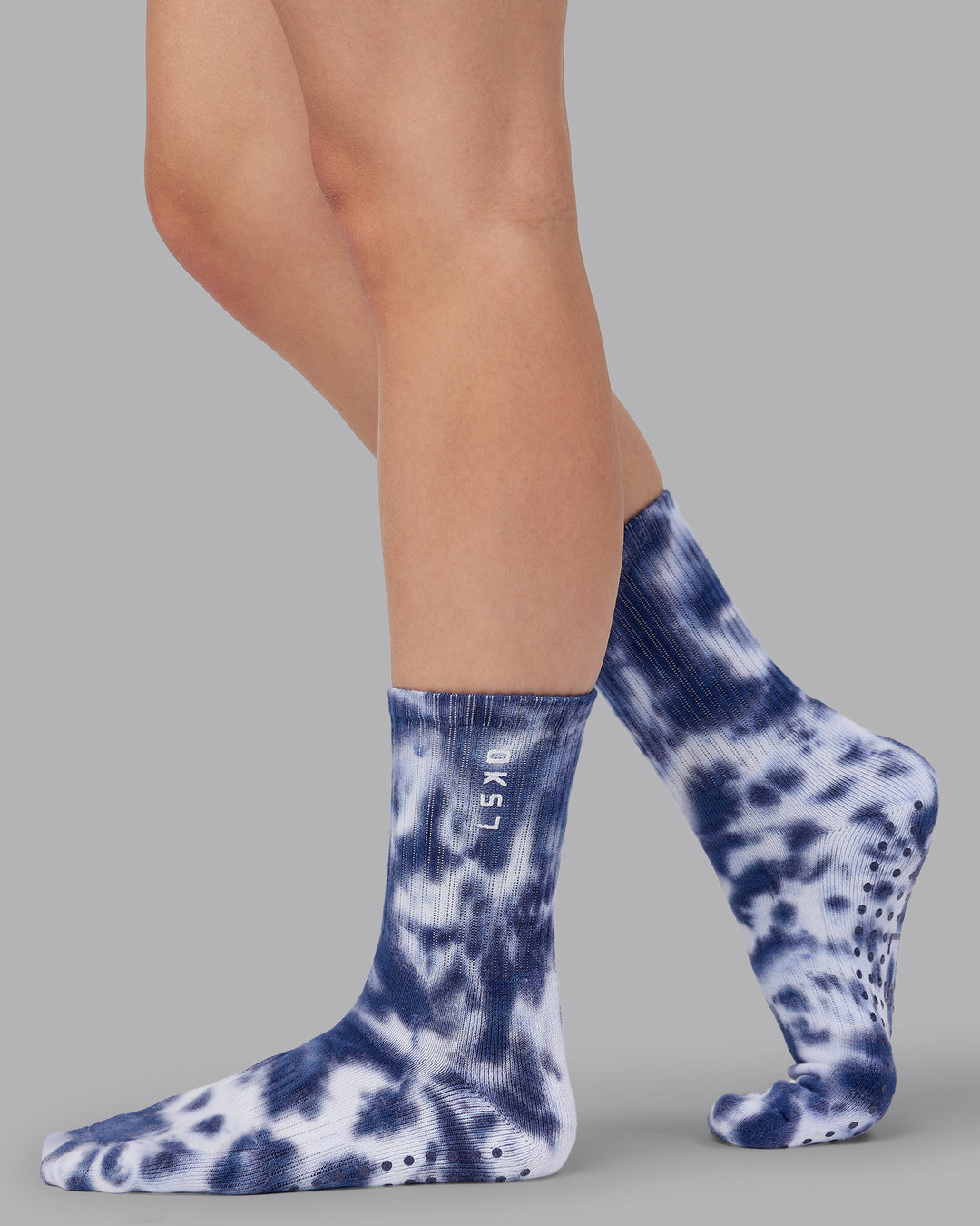 Woman wearing Signal Crew Pilates Grip Socks - Indigo Tie Dye