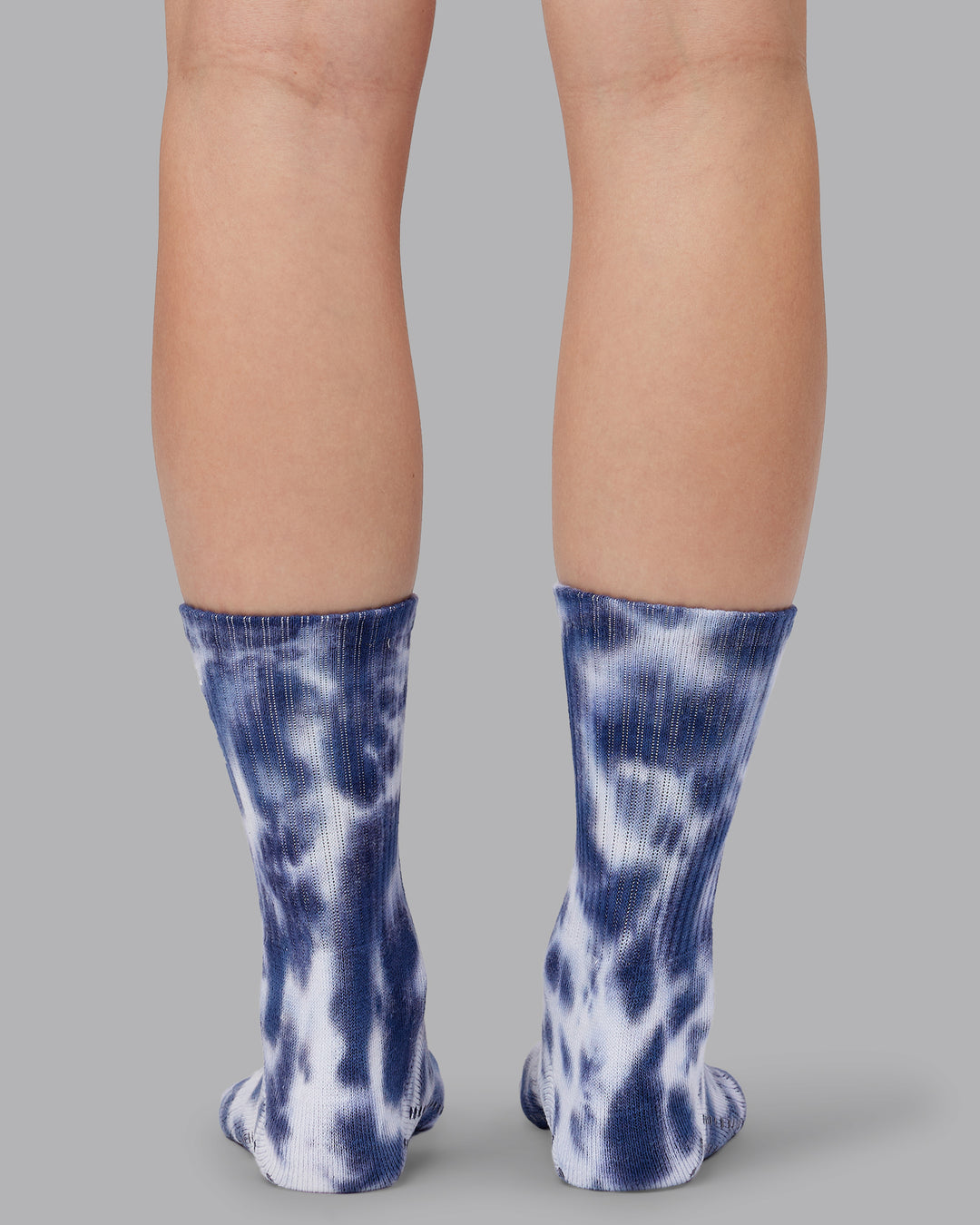 Woman wearing Signal Crew Pilates Grip Socks - Indigo Tie Dye