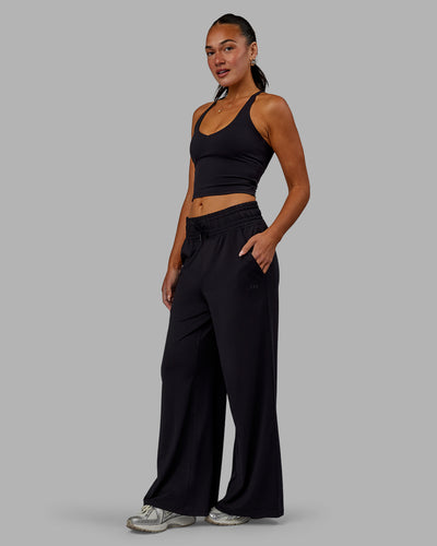 Woman wearing Restore CloudFLX Wide Leg Pants - Black