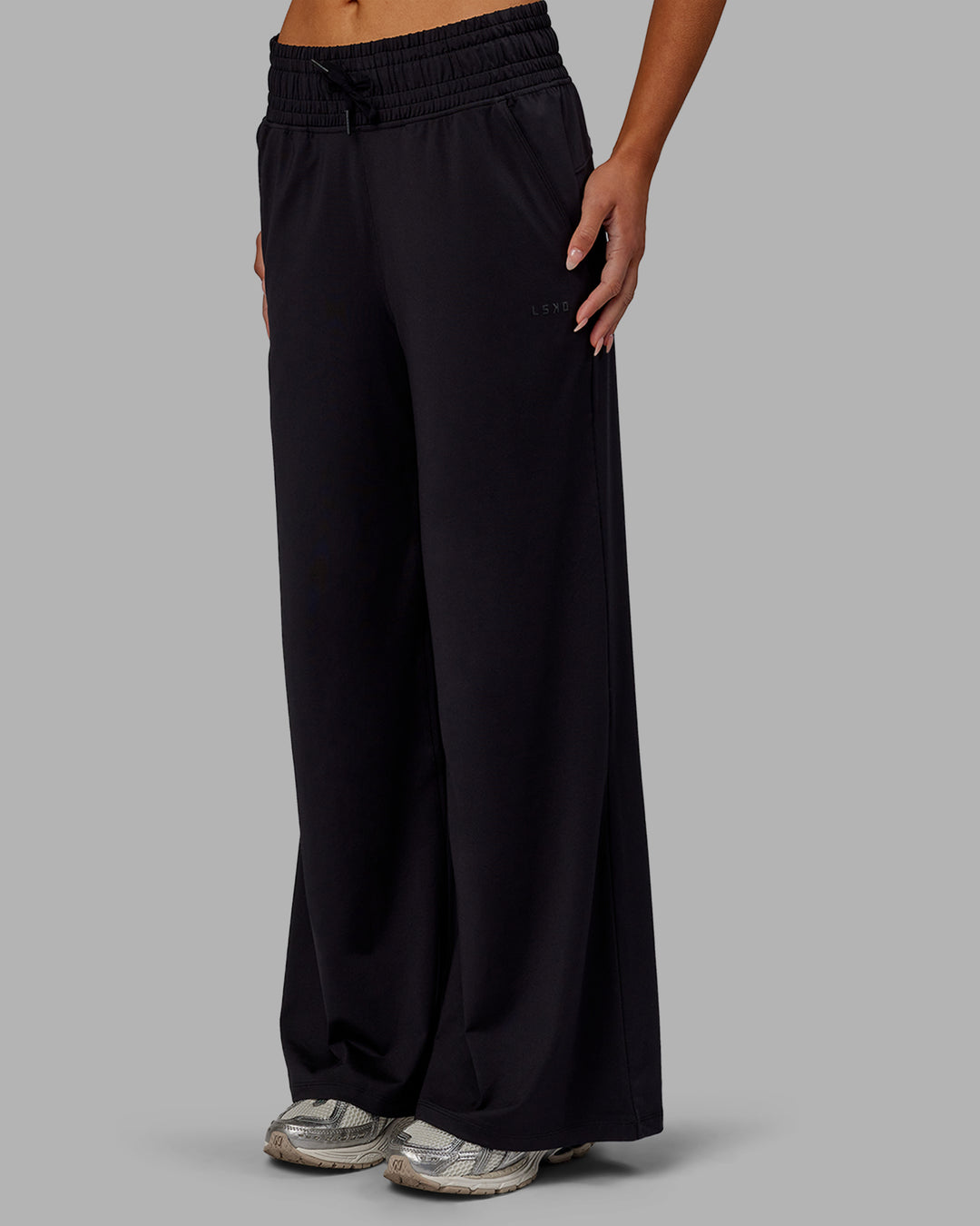 Woman wearing Restore CloudFLX Wide Leg Pants - Black