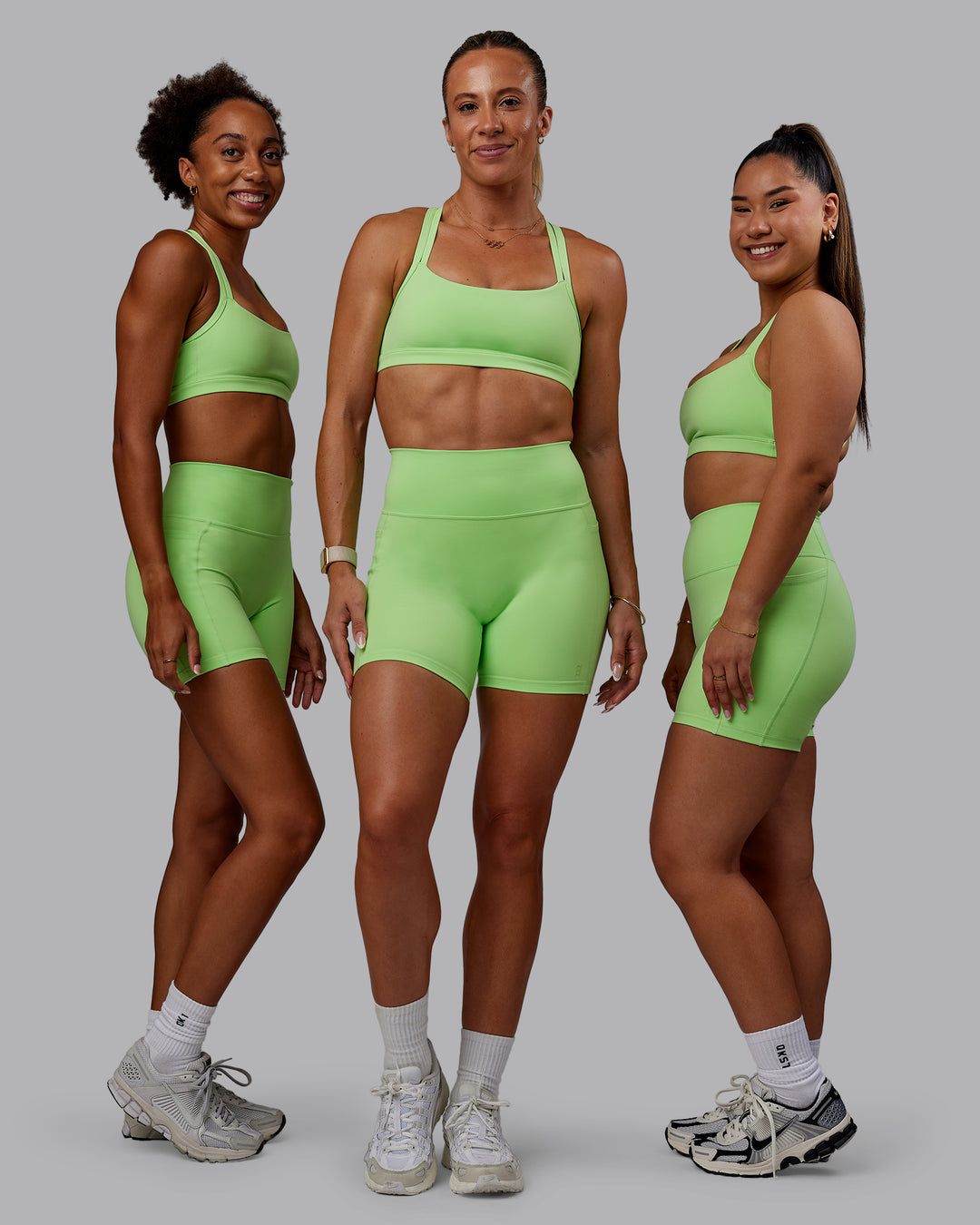 Women wearing Bree Masters Fusion Mid Short Tights with Pockets - Pastel Lime