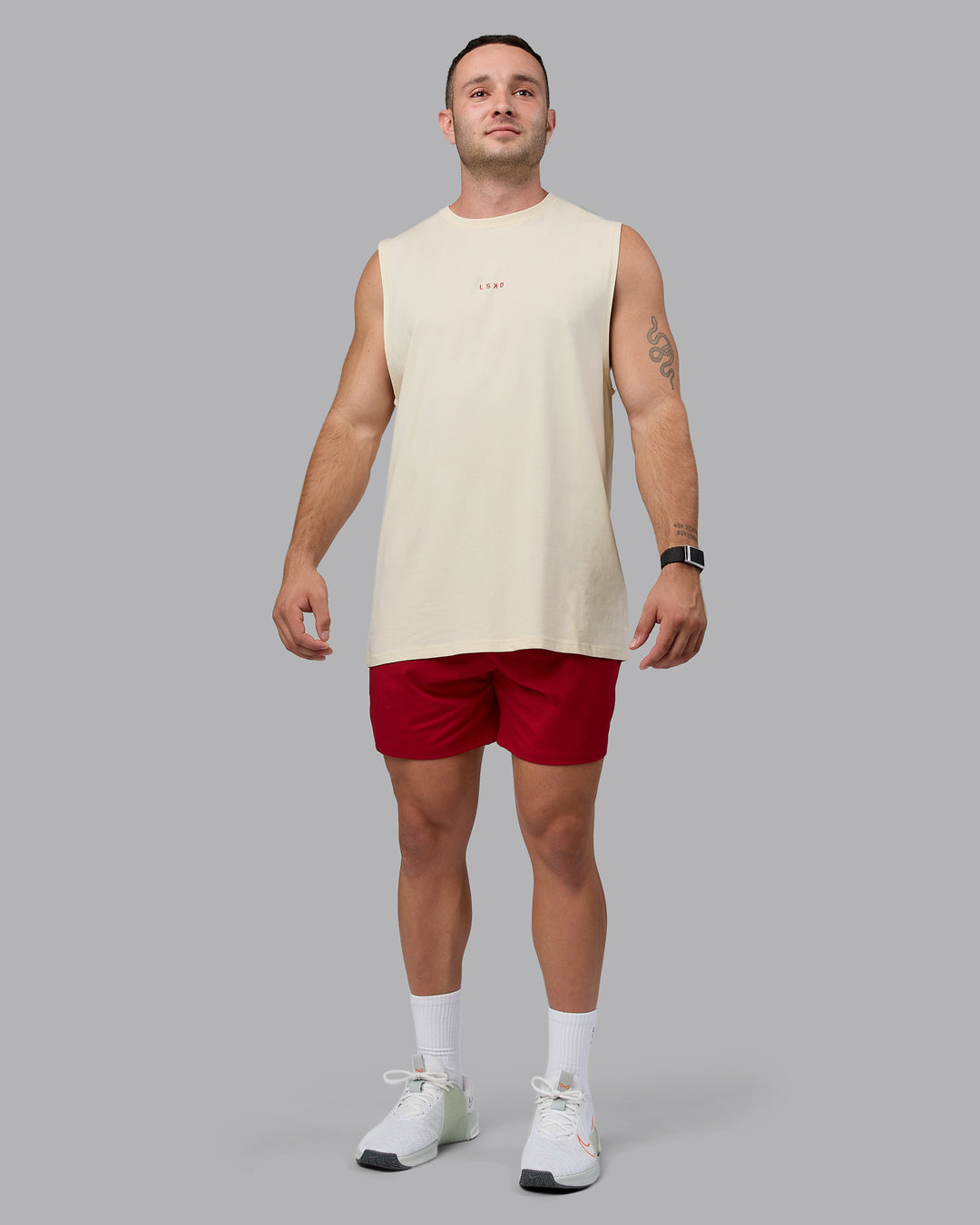 Man wearing Base FLXCotton Tank - Ivory-Cherry Red