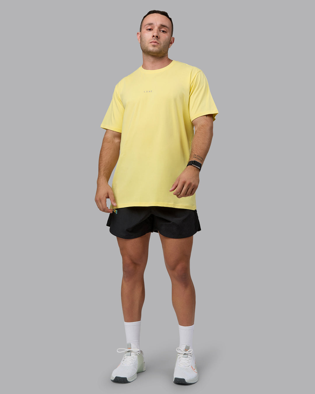 Man wearing Base FLXCotton Tee - Pale Yellow