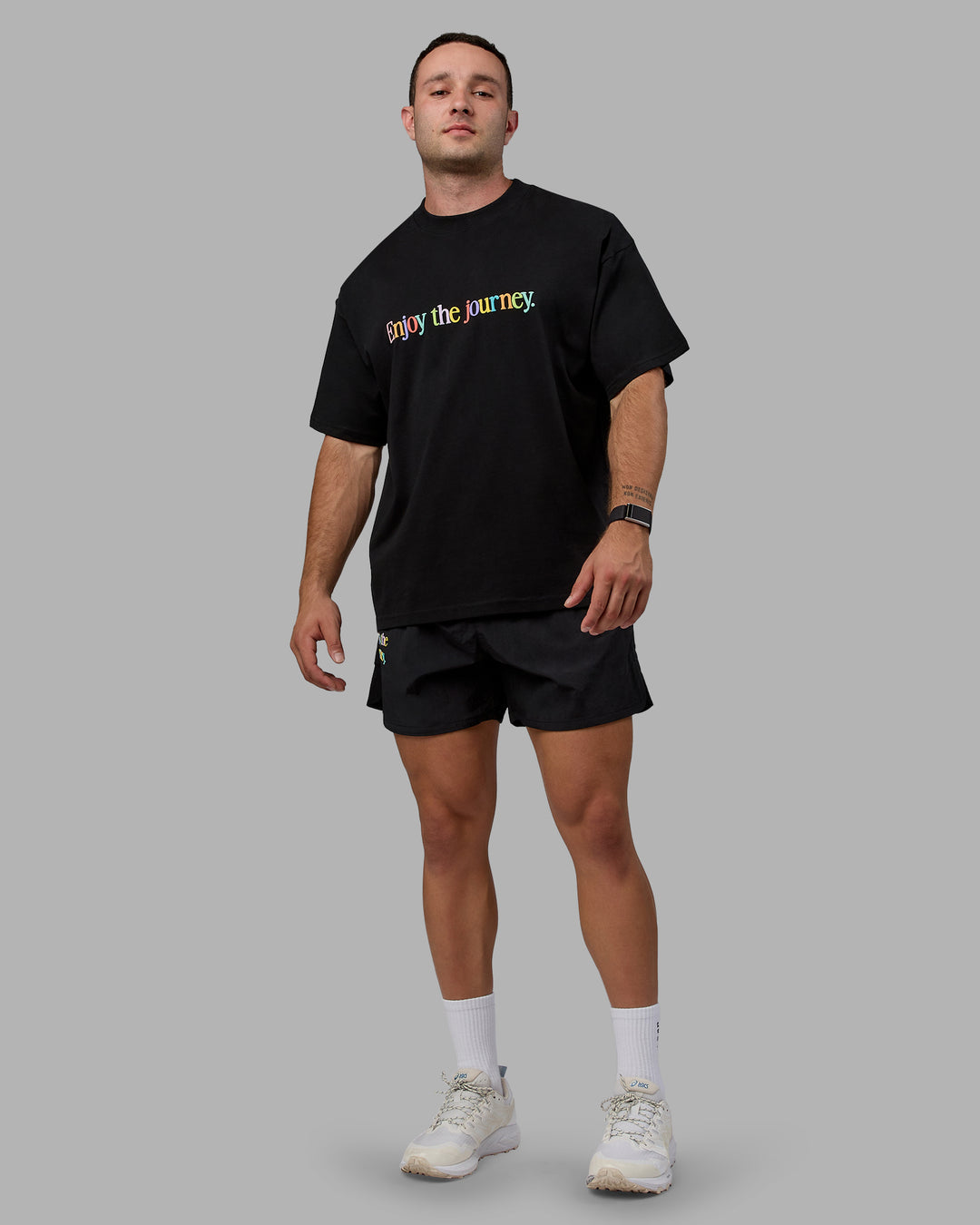 Man wearing Enjoy The Journey 5&quot; Shorts - Black-Multi