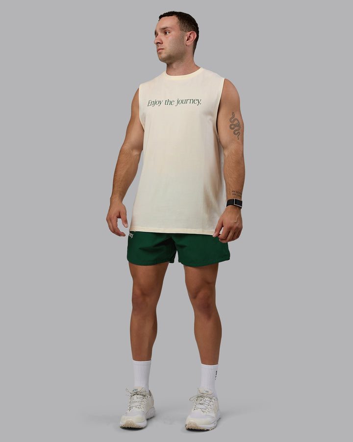 Man wearing Enjoy The Journey FLXCotton Tank - Off White-Deep Emerald
