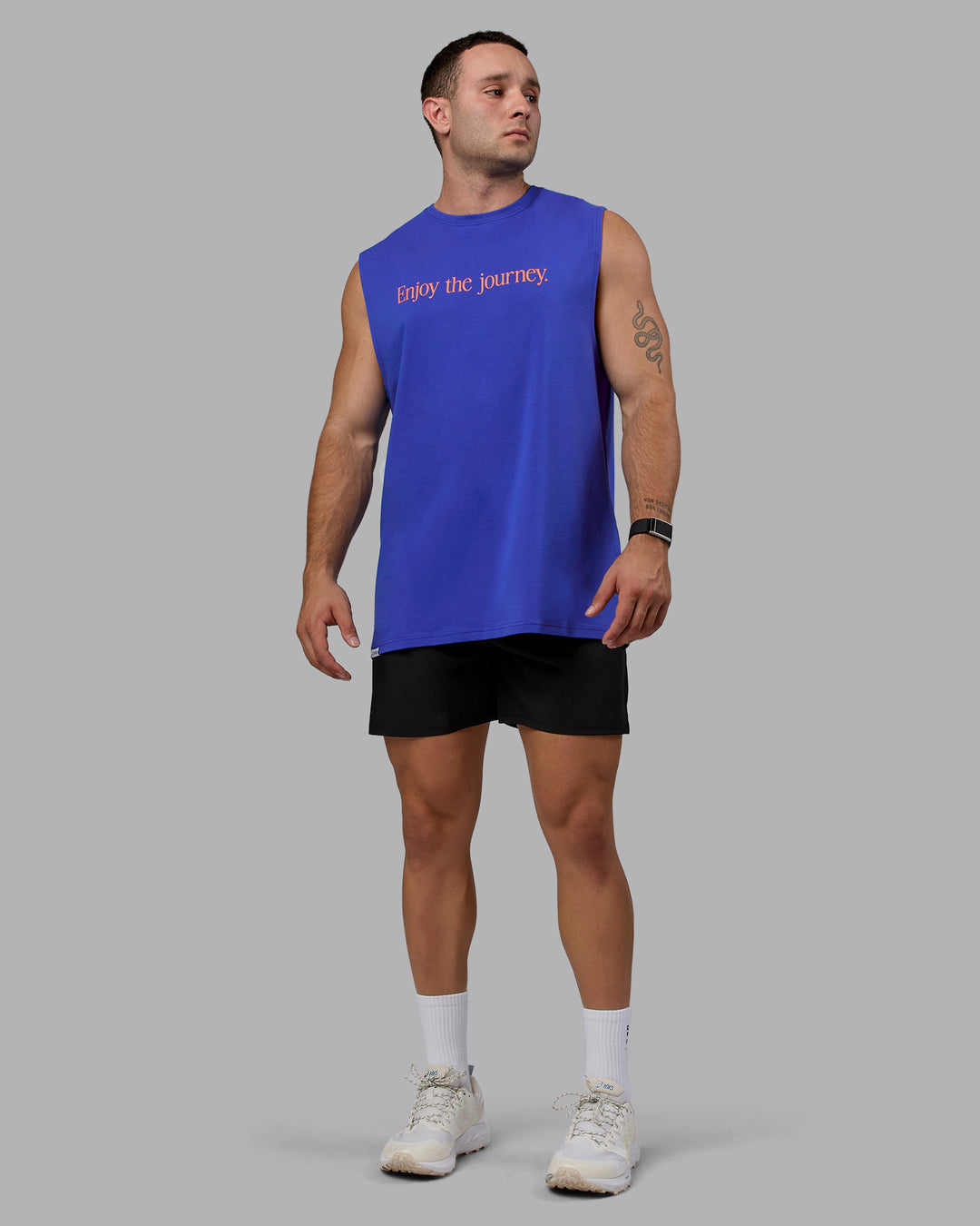 Man wearing Enjoy The Journey FLXCotton Tank - Power Cobalt-Orange