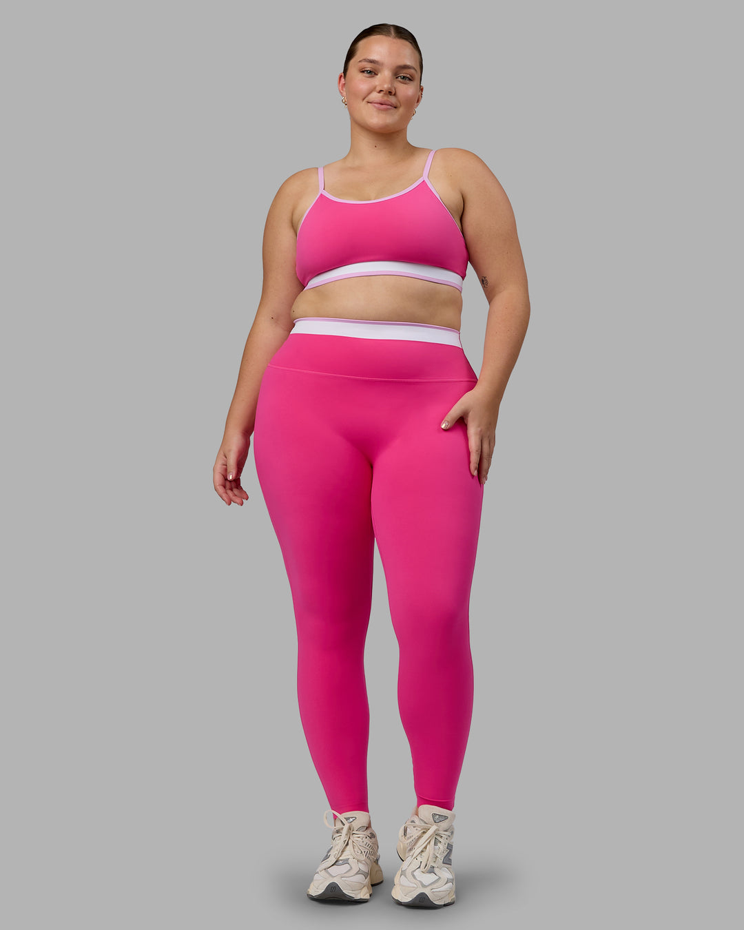 Woman wearing Excel Full Length Tights - Ultra Pink