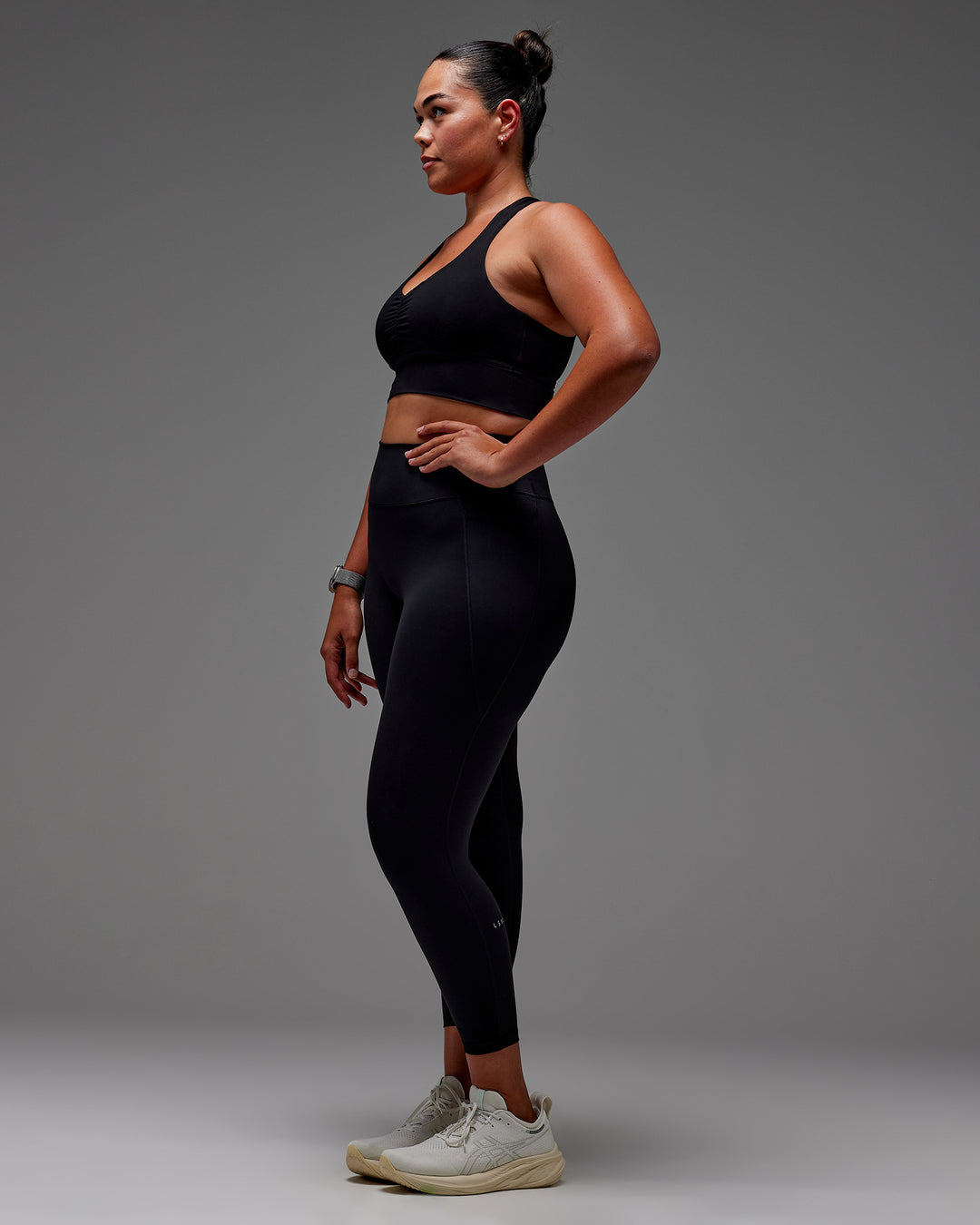 Woman wearing Fusion 7/8 Length Tight With Pockets in Black | Model:Aimee | Size:XL