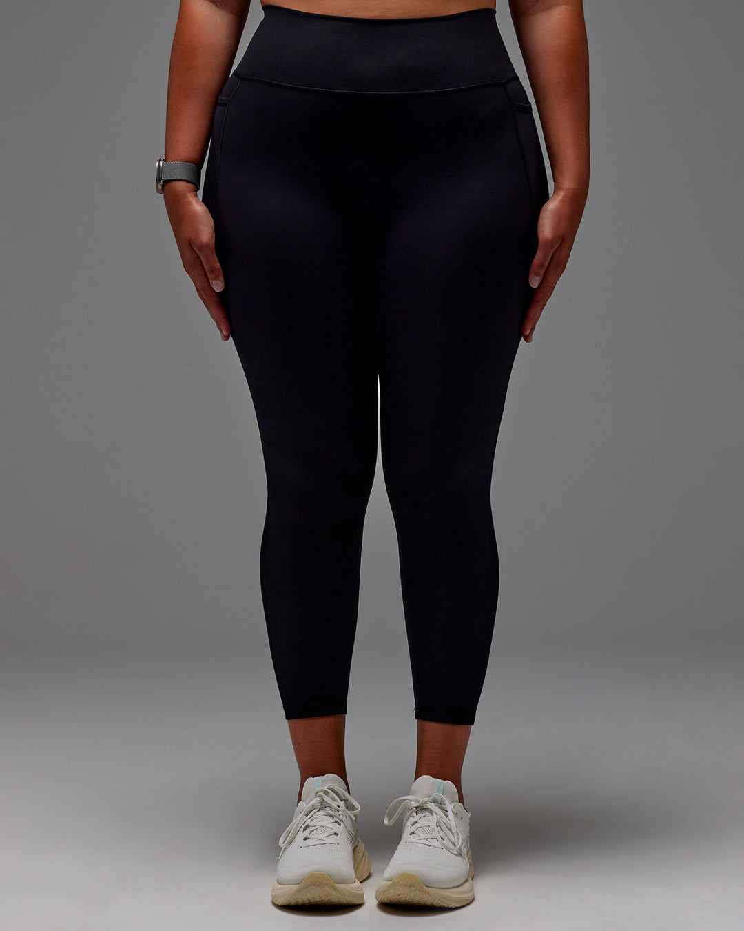 Woman wearing Fusion 7/8 Length Tight With Pockets in Black | Model:Aimee | Size:XL