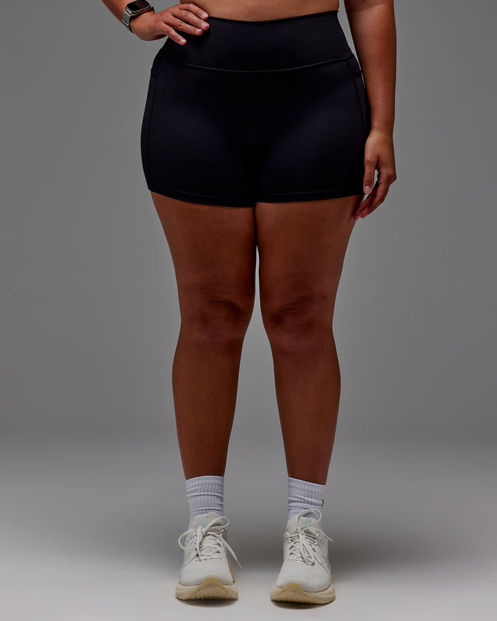 Woman wearing Fusion X-Short Tight With Pockets in Black | Model:Aimee | Size:XL
