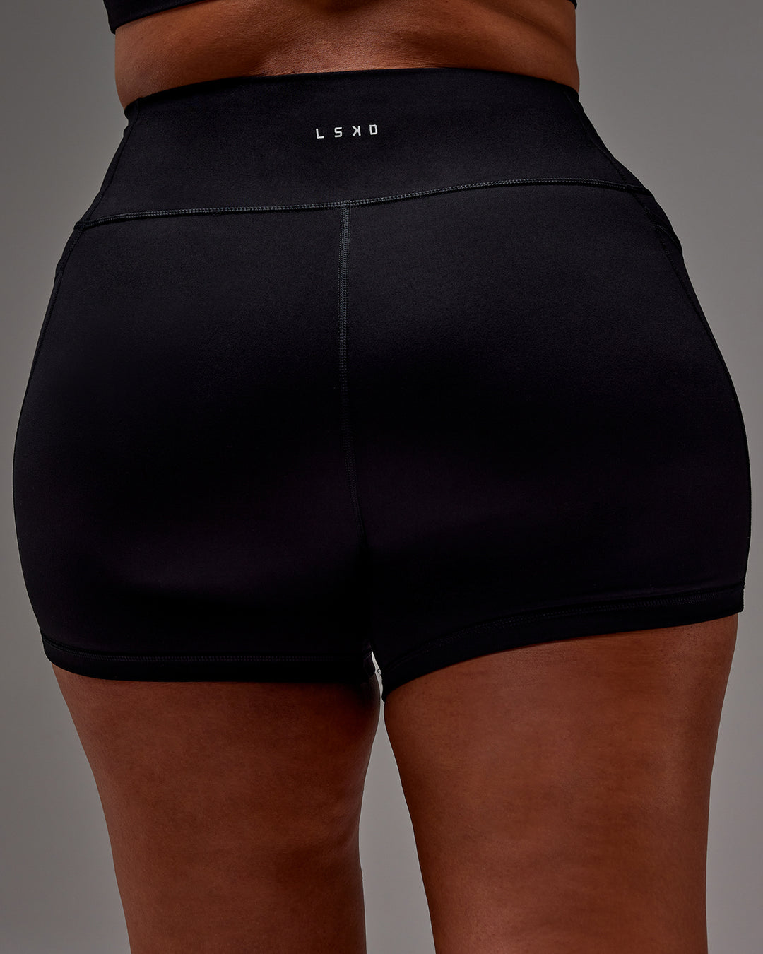 Woman wearing Fusion X-Short Tight With Pockets in Black | Model:Aimee | Size:XL