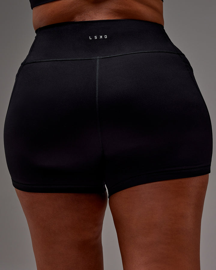 Woman wearing Fusion X-Short Tight With Pockets in Black | Model:Aimee | Size:XL
