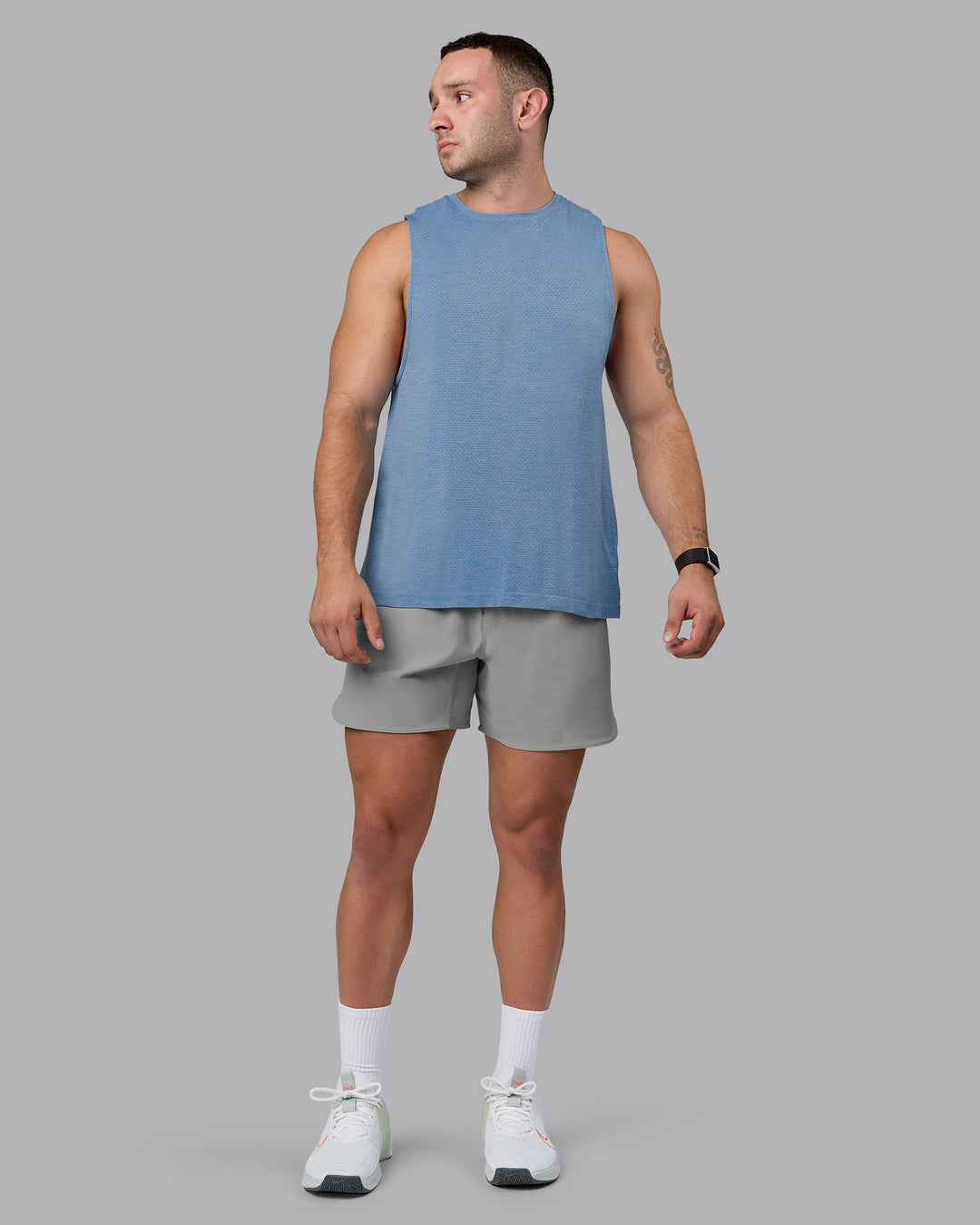 Man wearing Lift 6&quot; Lined Performance Shorts - Circular Grey