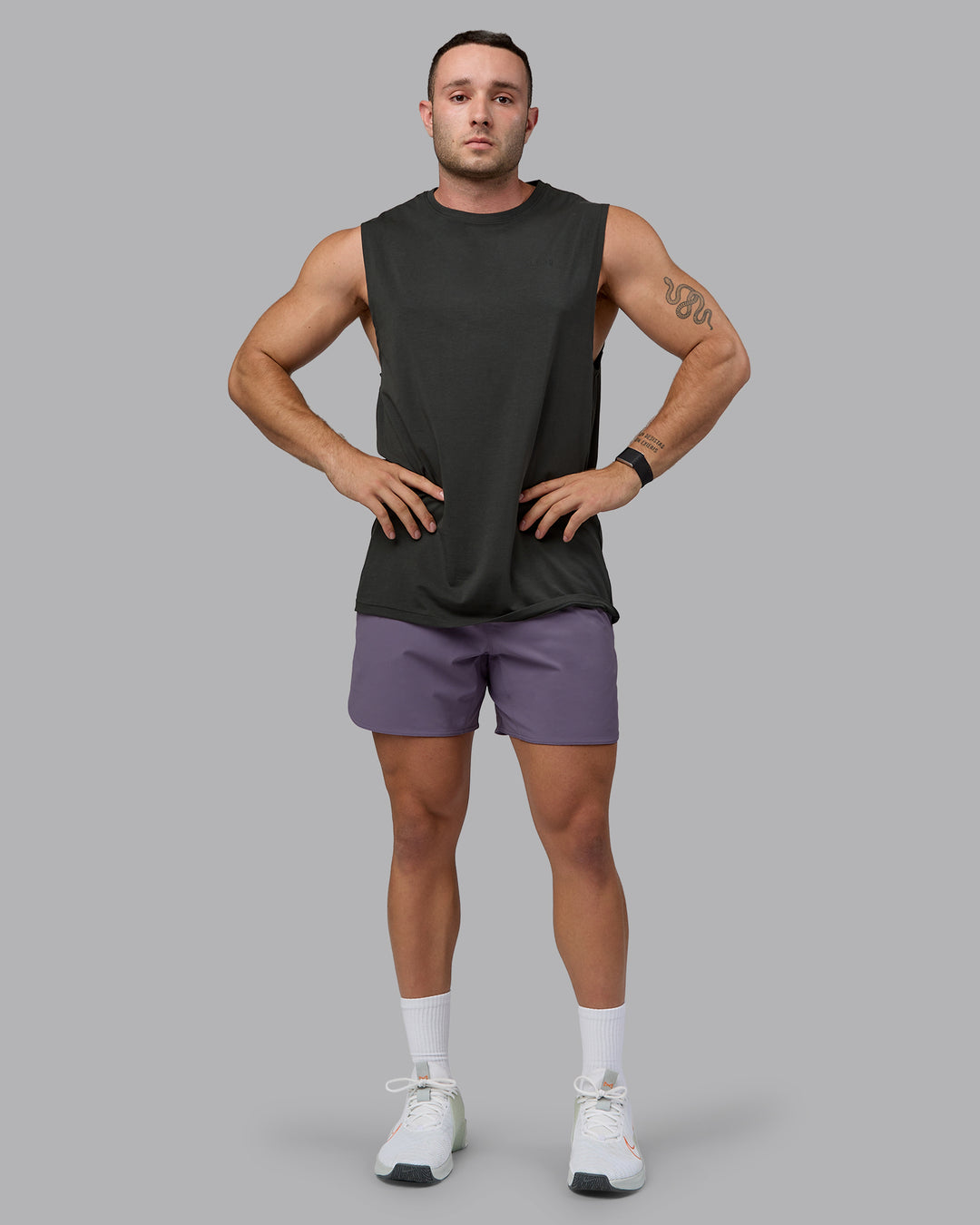 Man wearing Lift 6&quot; Lined Performance Shorts - Purple Sage