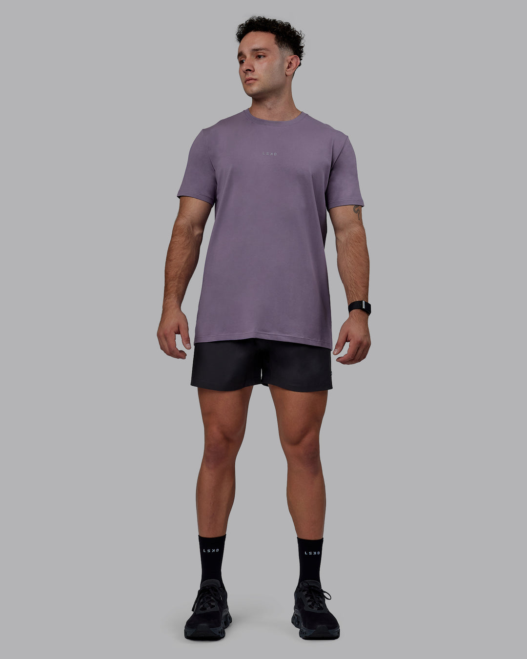 Man wearing Rep 5&quot; Lined Performance Shorts - Pirate Black