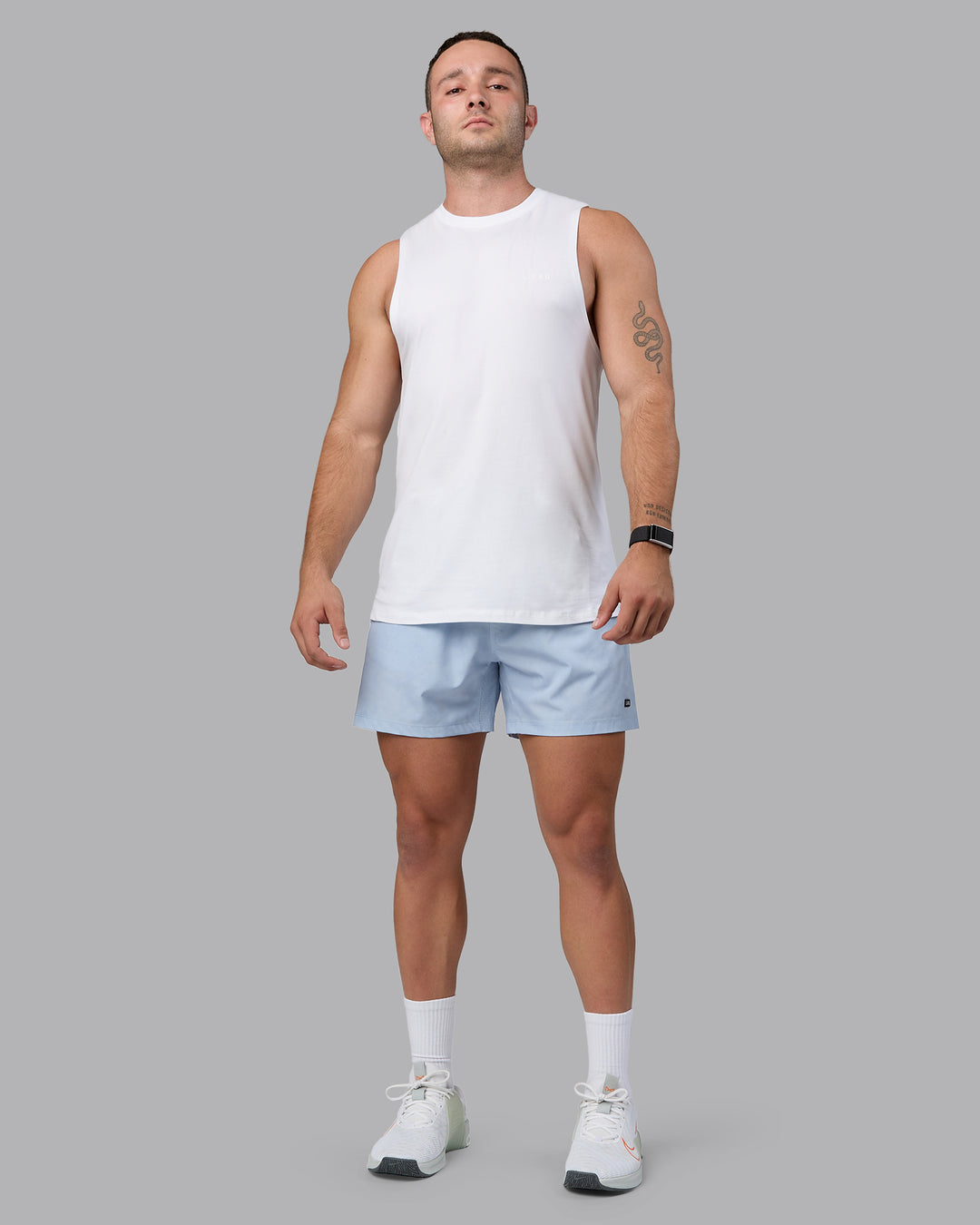 Man wearing Rep 5&quot; Performance Shorts - Digital Camo Ice Blue