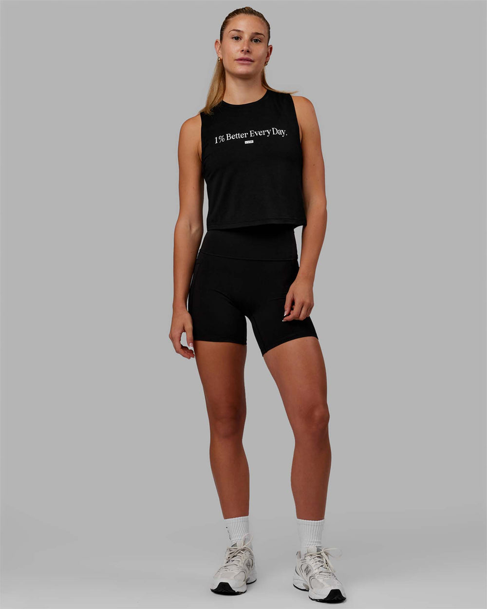 Woman wearing 1% Better Training Tank - Black-White