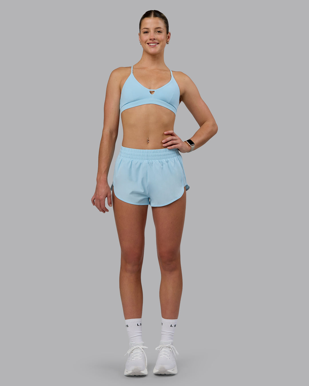 Woman wearing Energy 1.8&quot; Training Shorts - Crystal Blue